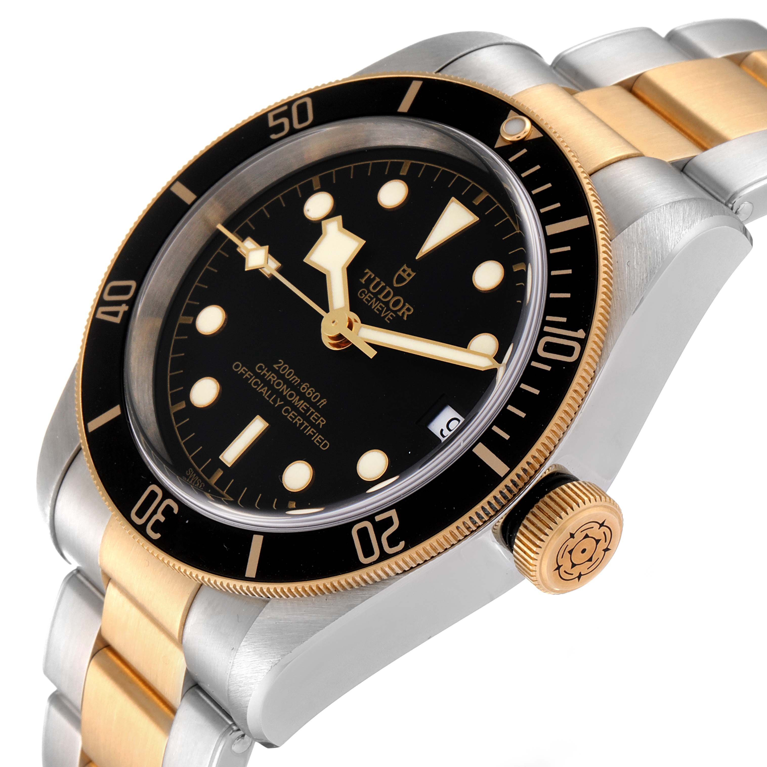 The image shows a close-up side angle of the Tudor Heritage Black Bay 79733 Men's Steel and Gold (two tone) Black Dial 79733 Men's Steel and Gold (two tone) Black Dial watch, highlighting the dial, bezel, crown, and bracelet.
