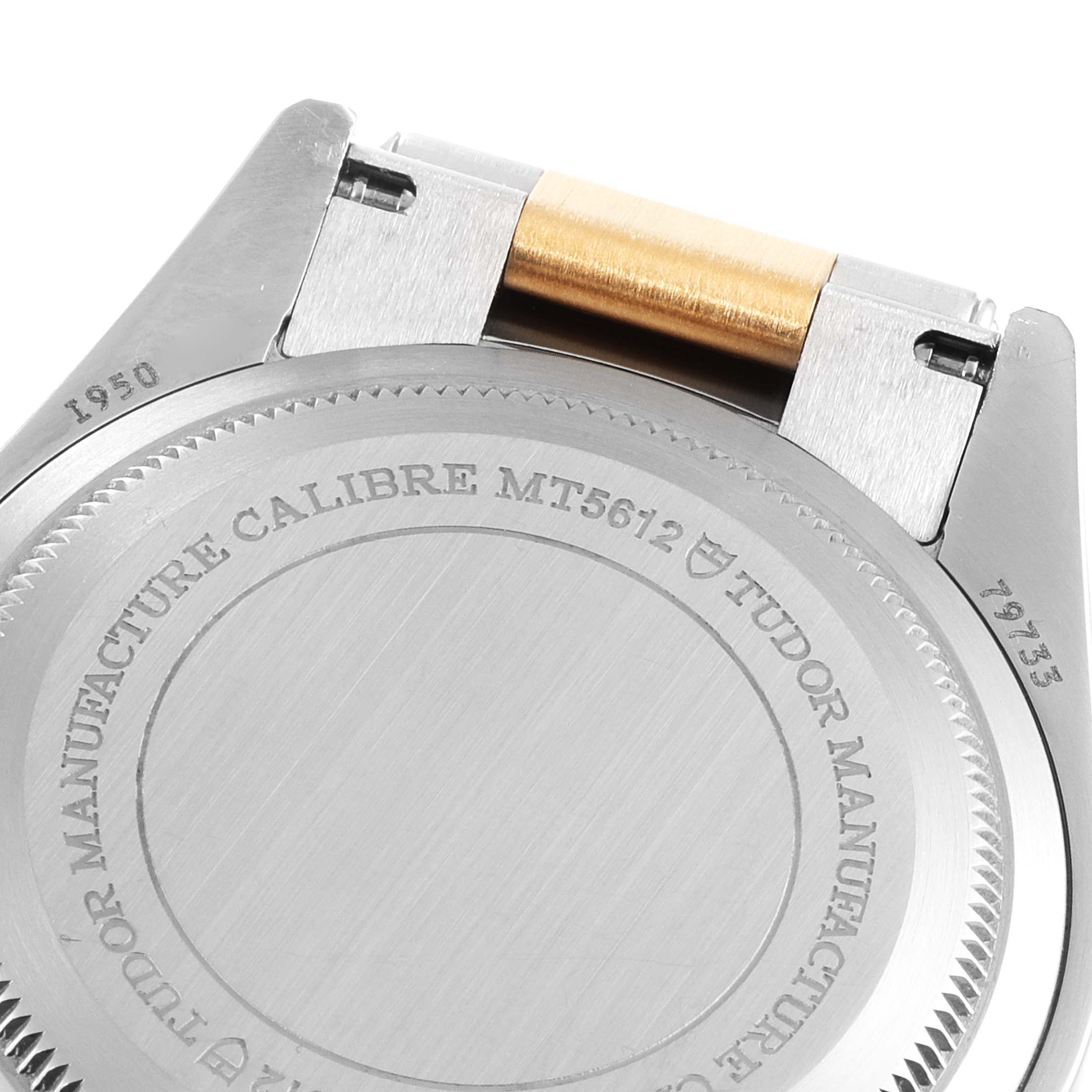 This image shows the case back of the Tudor Heritage Black Bay 79733 Men's Steel and Gold (two tone) Black Dial 79733 Men's Steel and Gold (two tone) Black Dial watch, highlighting the model number and the Tudor logo.