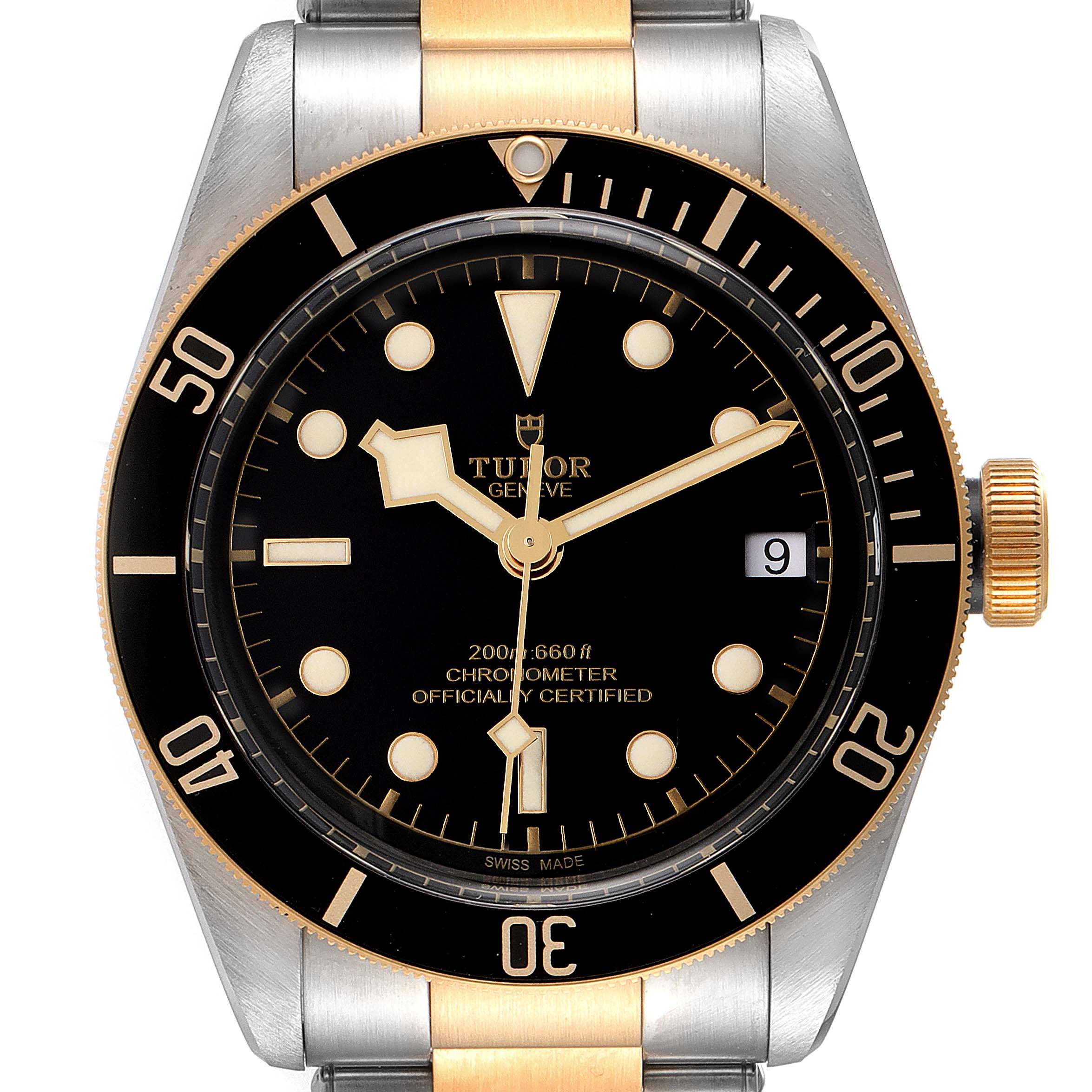 The image shows a straight-on view of the Tudor Heritage Black Bay 79733 Men's Steel and Gold (two tone) Black Dial 79733 Men's Steel and Gold (two tone) Black Dial watch, highlighting its dial, bezel, and part of the bracelet.