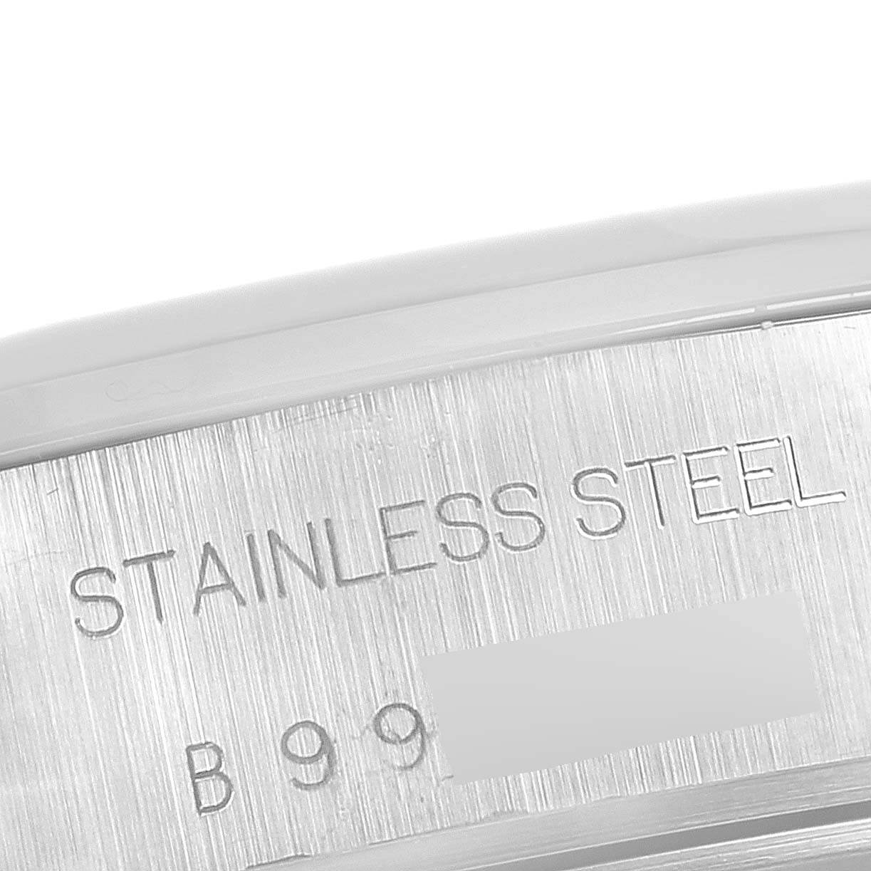 The image shows a close-up of the stainless steel case back engraving on a Tudor Tiger 79263 Men's Steel and Gold (two tone) White Dial 79263 Men's Steel and Gold (two tone) White Dial model watch.