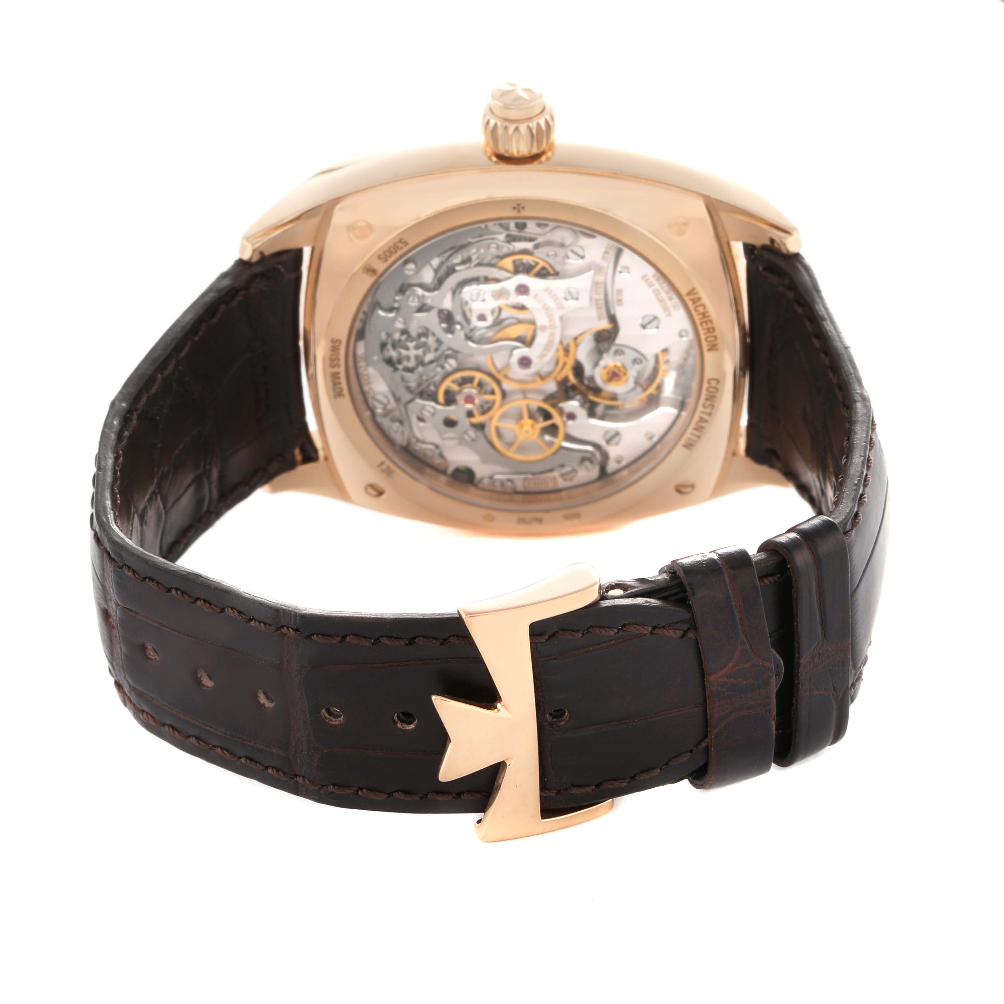 The Vacheron Constantin Harmony 5300S/000R-B055 Men's Rose Gold Silver Dial model is shown from the back, highlighting its movement and brown leather strap with a gold buckle.
