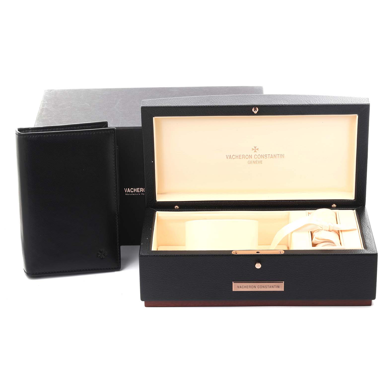 The image shows the packaging for the Vacheron Constantin Overseas 47040/000A Men's Stainless Steel Blue Dial 47040/000A Men's Stainless Steel Blue Dial watch, including a watch box and a leather wallet, viewed from the front.