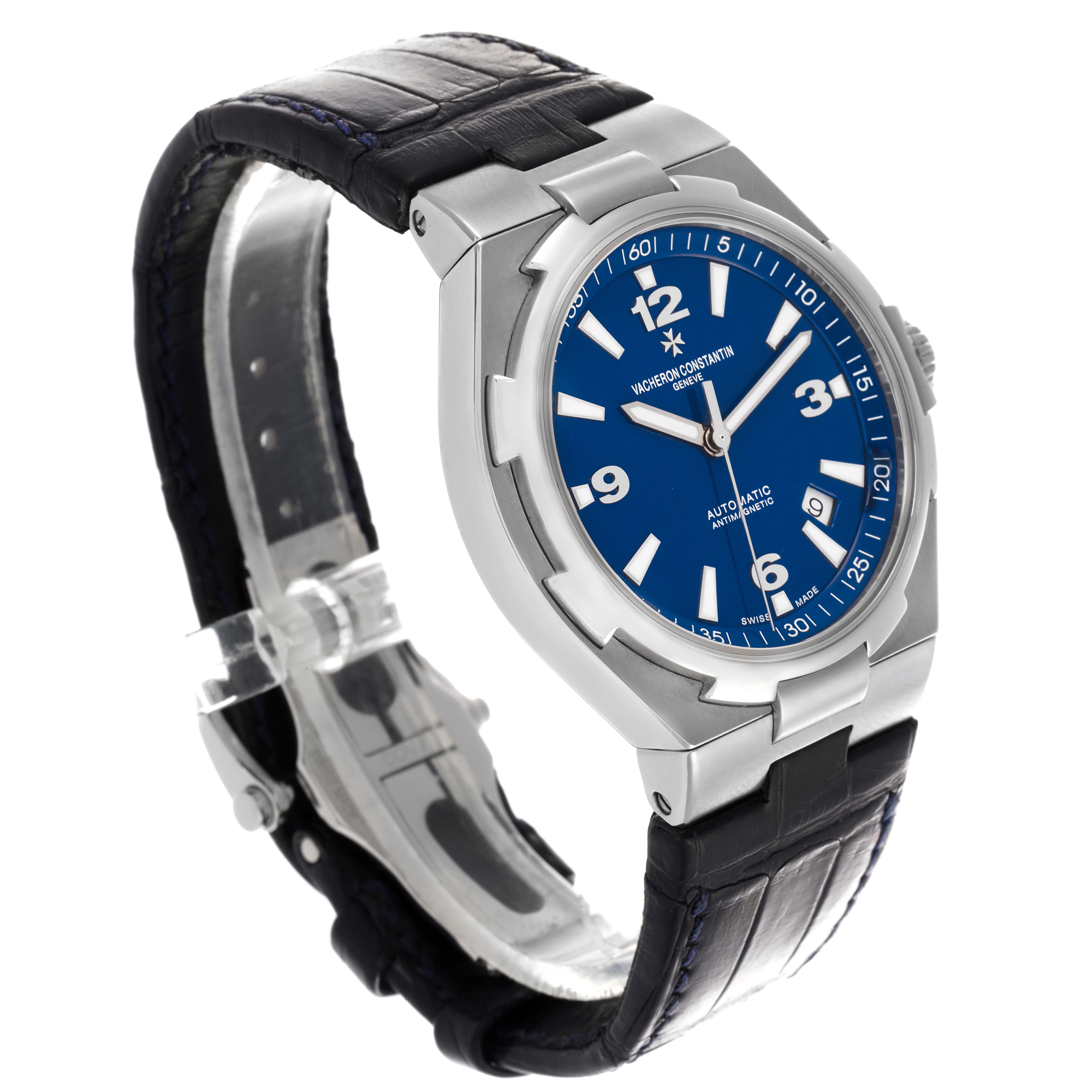The Vacheron Constantin Overseas 47040/000A Men's Stainless Steel Blue Dial 47040/000A Men's Stainless Steel Blue Dial watch is shown at a three-quarter angle, displaying the blue dial, bezel, and leather strap.
