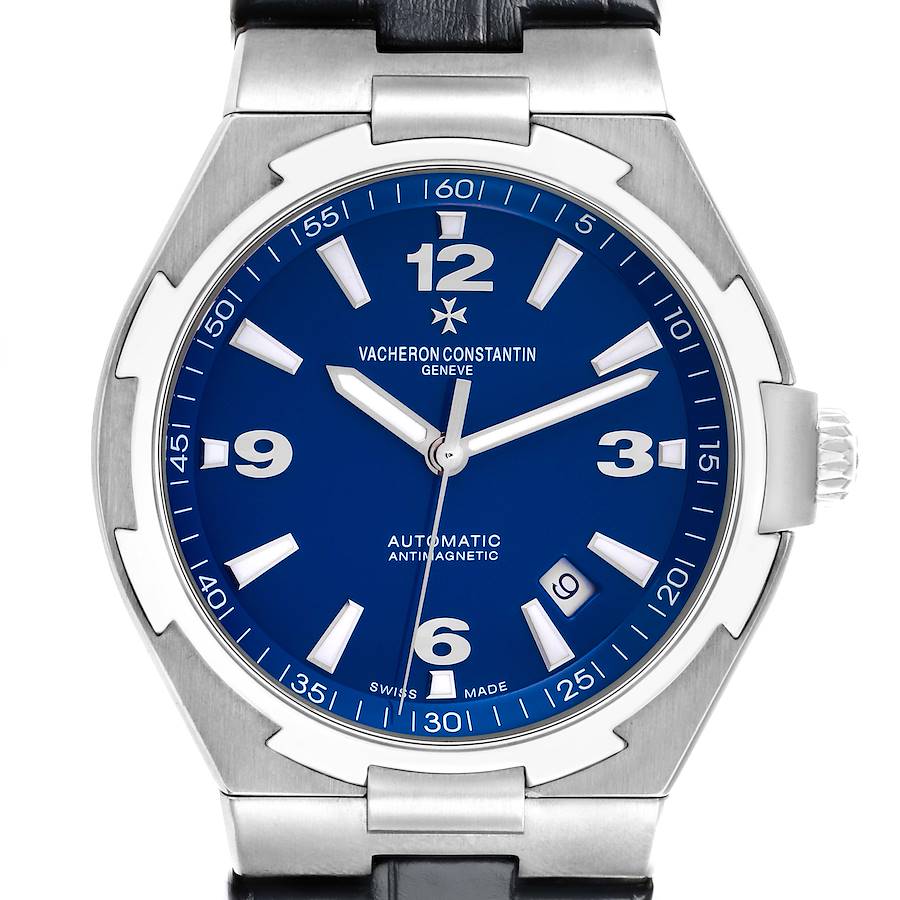 The Vacheron Constantin Overseas watch is shown in a direct front angle, highlighting the blue dial and bezel.