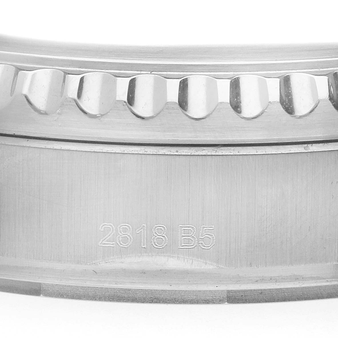 The image shows a close-up side view of the bezel and case edge of a Breitling Navitimer A13314101C1X2 Men's Stainless Steel Blue Dial watch, featuring a serial number.