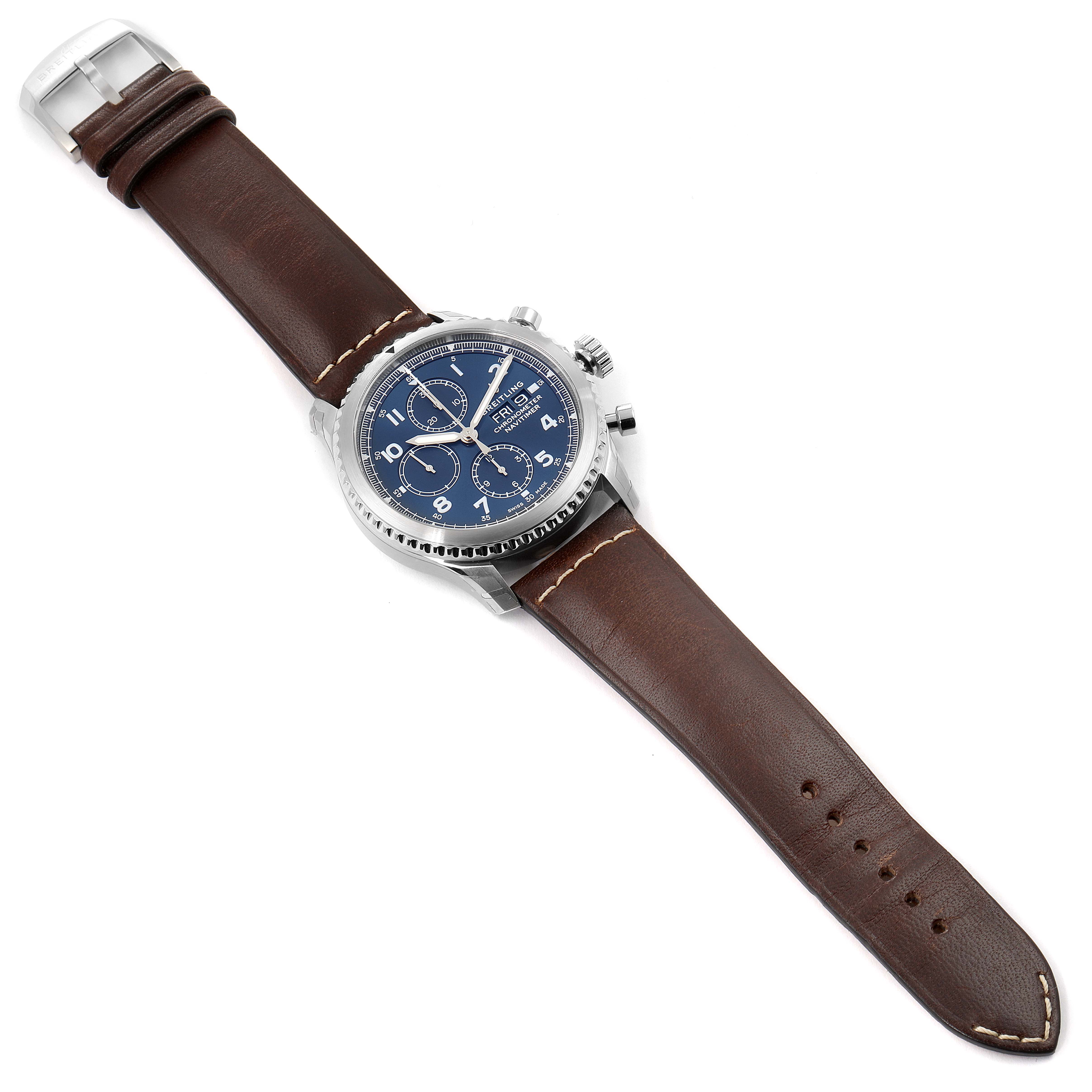 The image shows a Breitling Navitimer A13314101C1X2 Men's Stainless Steel Blue Dial A13314101C1X2 Men's Stainless Steel Blue Dial watch from a top-down angle, highlighting its brown leather strap and blue dial.