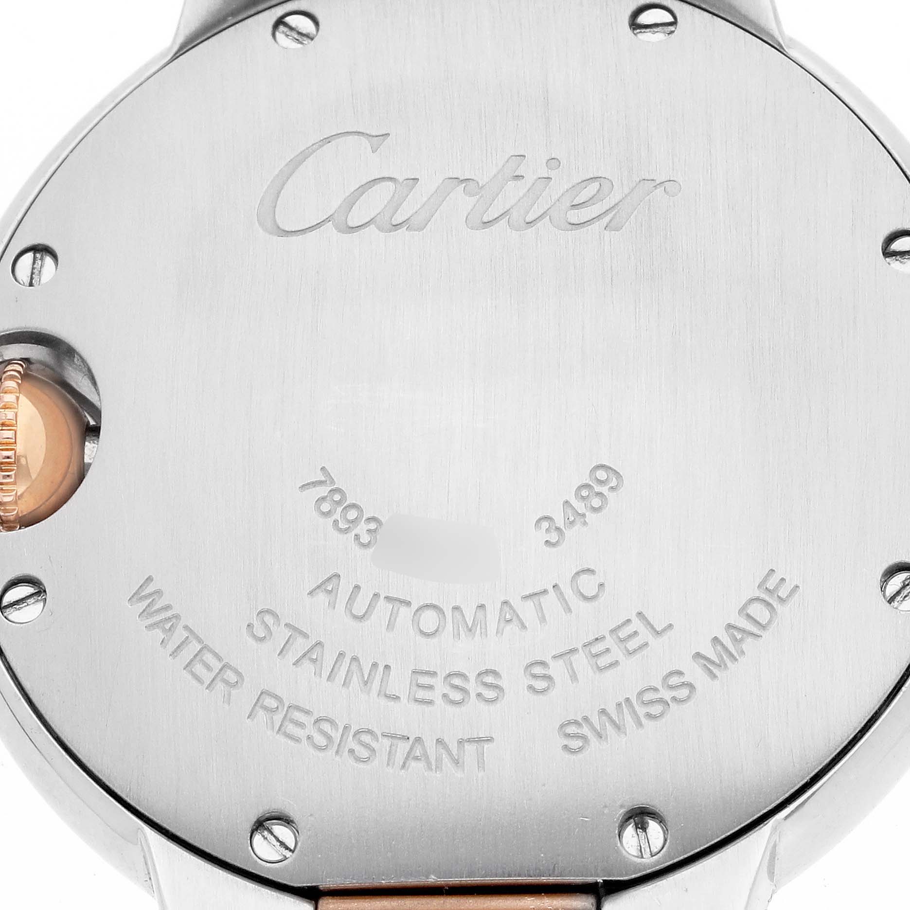 The image shows the back of a Cartier Ballon Bleu W6920098 Women's Steel and Gold (two tone) Mother of Pearl Dial watch, highlighting its stainless steel case and inscription details.