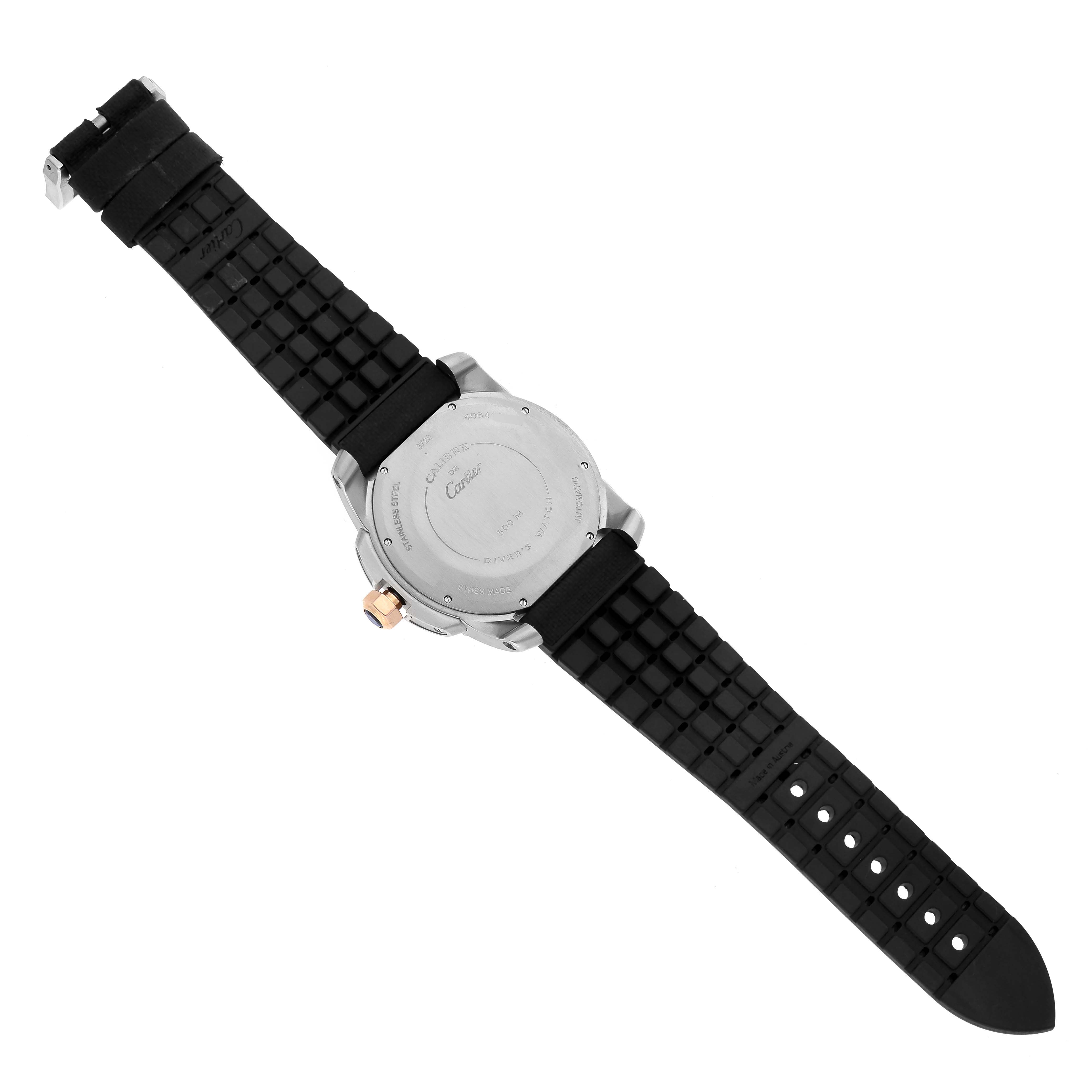 The Calibre de Cartier by Cartier is shown from the back, displaying the case back and black strap.