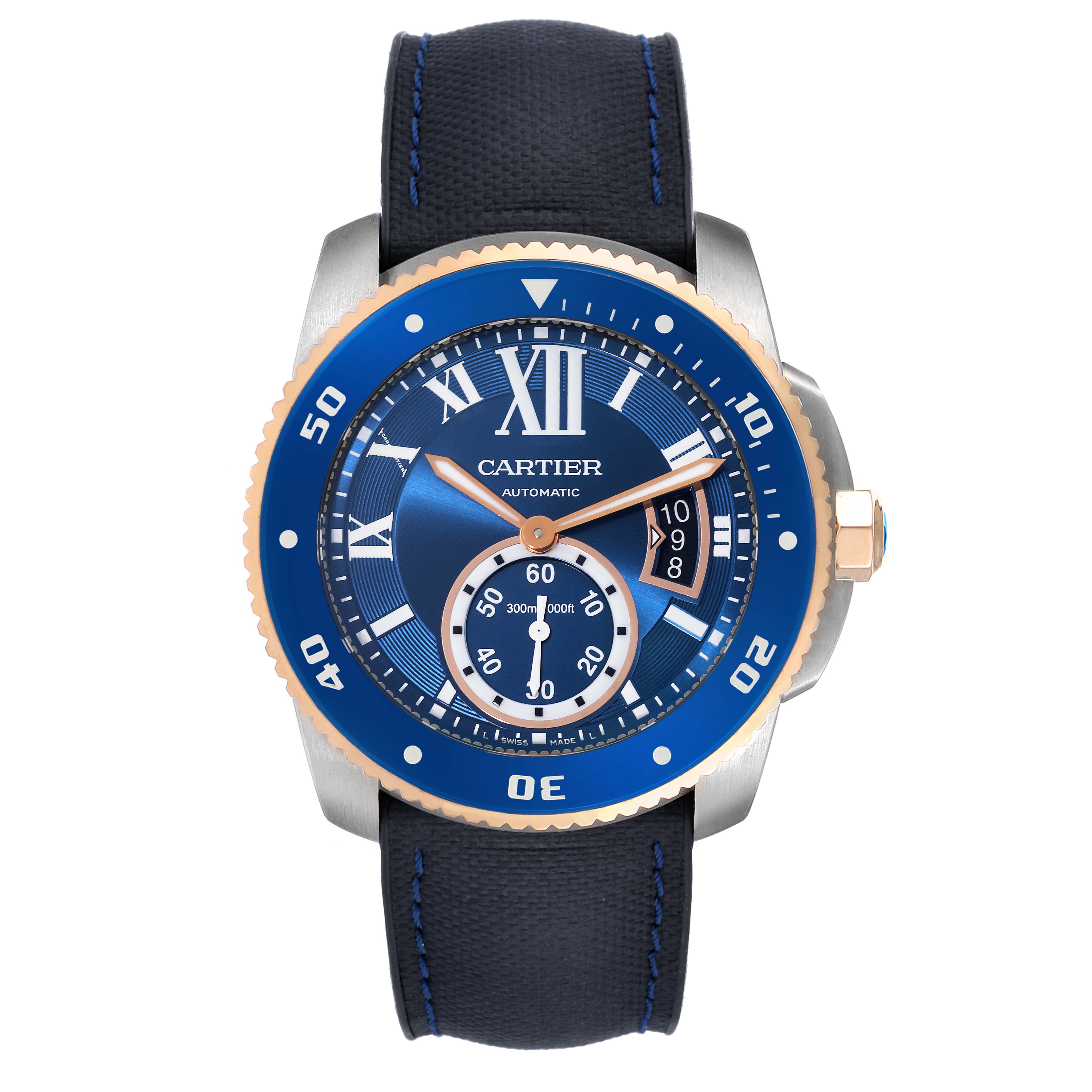 The image shows a front view of the Calibre de Cartier watch by Cartier, displaying the blue dial, bezel, hands, and strap.