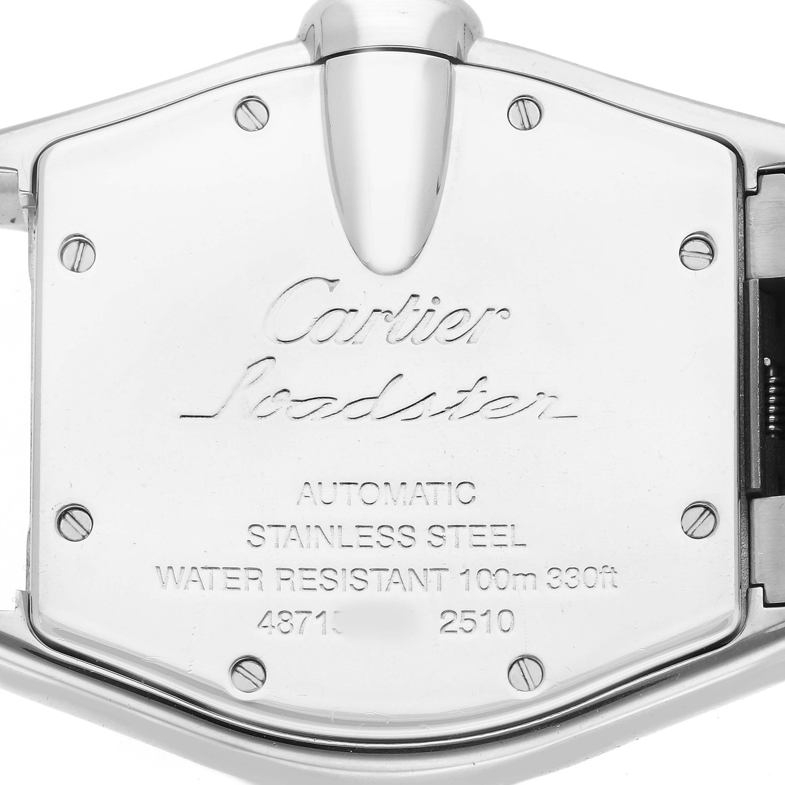 The image shows the back of a Cartier Roadster W62025V3 Men's Stainless Steel Silver Dial watch, highlighting the engraved details and water resistance information.