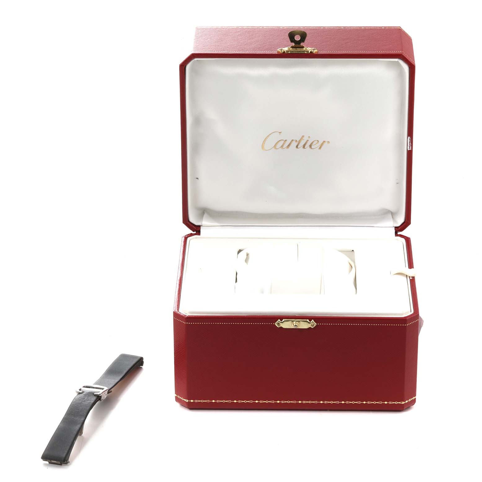 The image shows a Cartier Roadster W62016V3 Women
s Stainless Steel Silver Dial W62016V3 Women
s Stainless Steel Silver Dial watch box, open to reveal its interior, with an additional watch strap placed beside it.