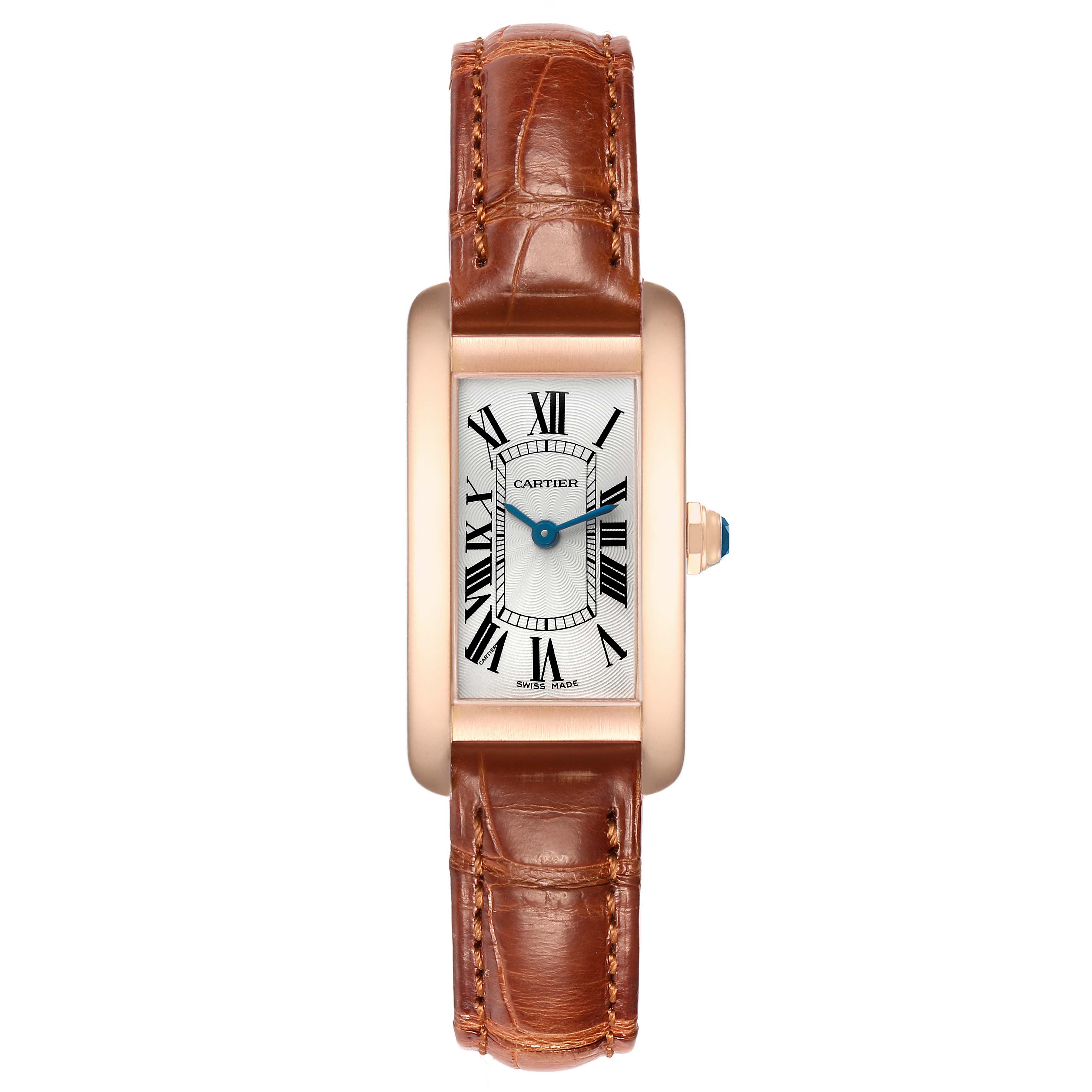 The Cartier Tank Americaine W2607456 Women's Rose Gold Silver Dial watch is shown from a front angle, displaying its rectangular face, Roman numerals, and brown leather strap.