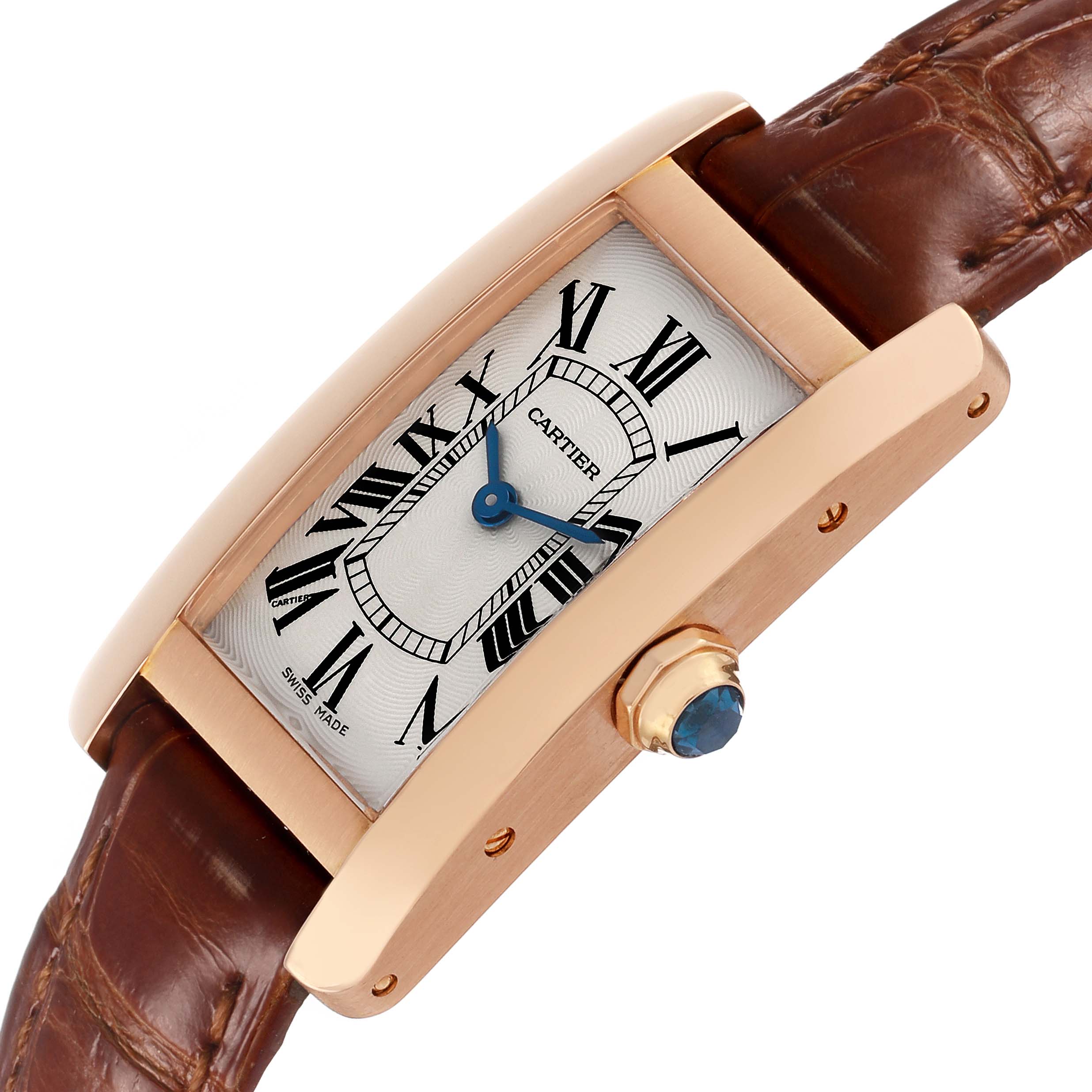 The Cartier Tank Americaine W2607456 Women's Rose Gold Silver Dial watch is shown at an angle, highlighting the rectangular face, case, crown, and leather strap.
