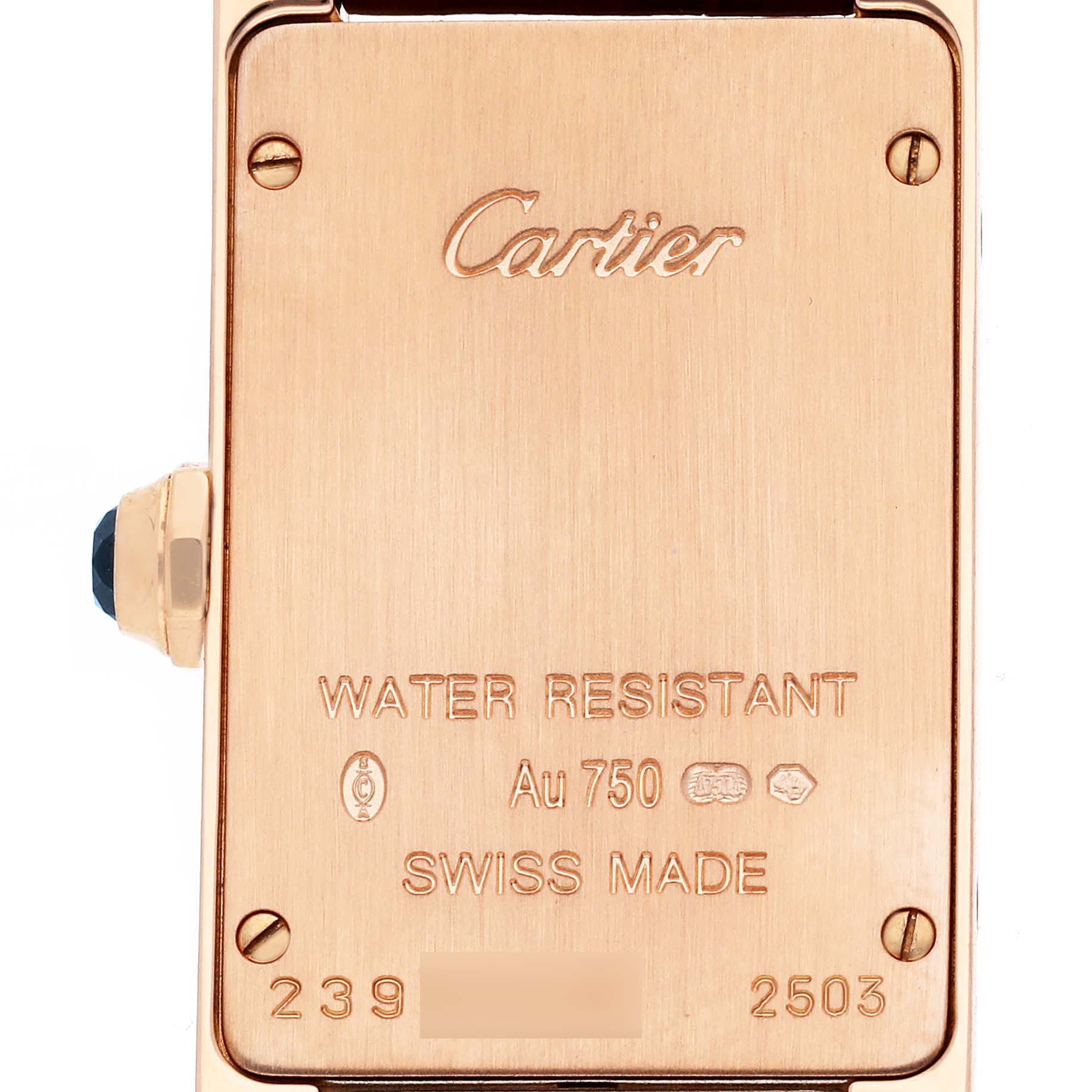 The image shows the back of a Cartier Tank Americaine W2607456 Women's Rose Gold Silver Dial watch, displaying engravings and a side view of the crown.