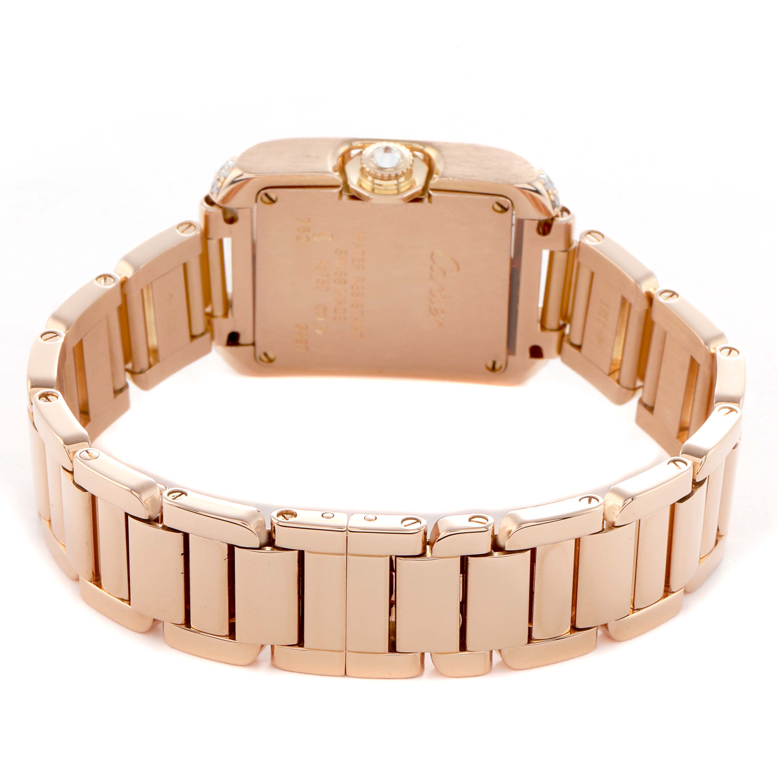 The Cartier Tank Anglaise WT100002 Women's Rose Gold Silver Dial watch is shown from the back, highlighting the case back and metal bracelet.