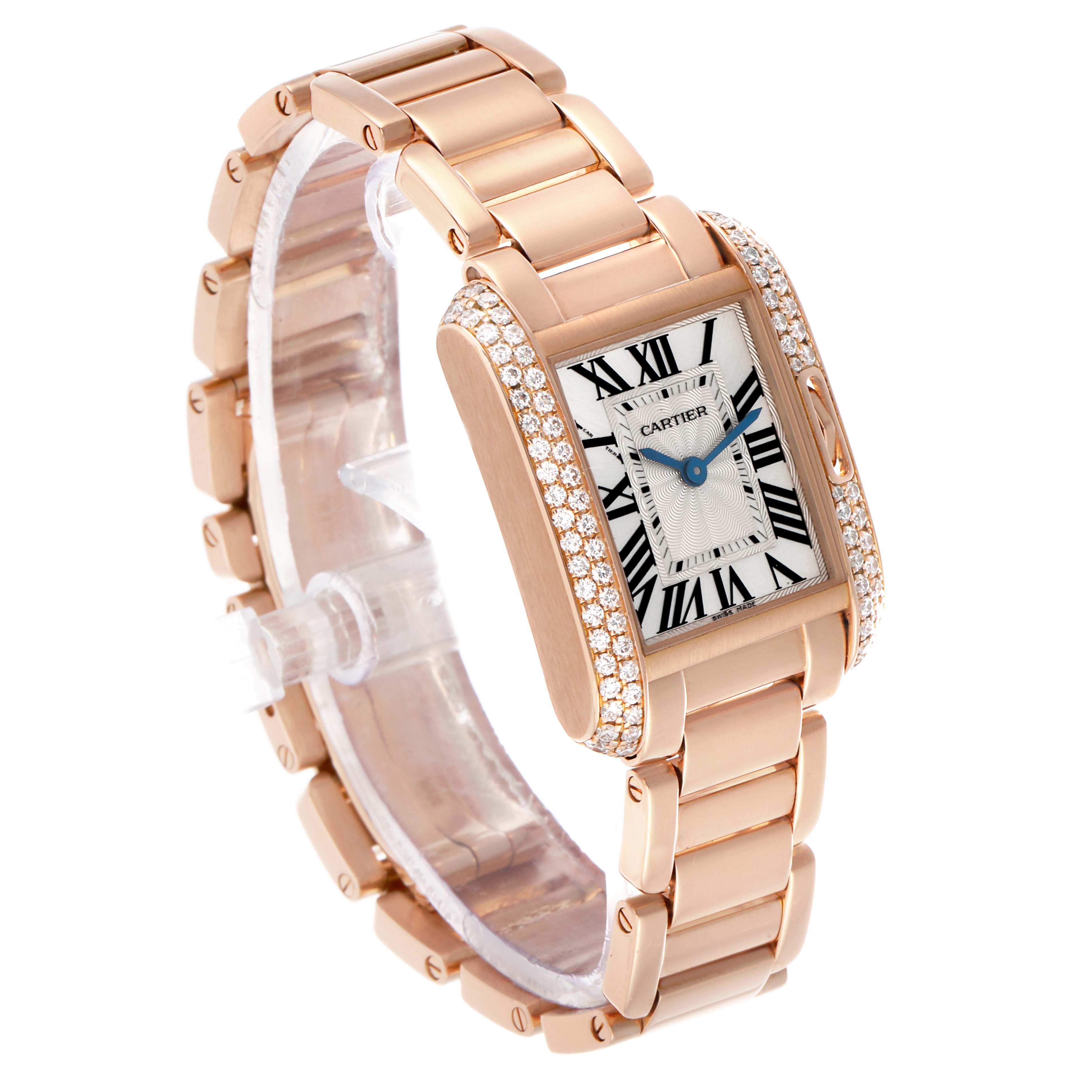 The Cartier Tank Anglaise WT100002 Women's Rose Gold Silver Dial watch is shown at a three-quarter angle, highlighting its bracelet, diamond-set case, and roman numeral dial.