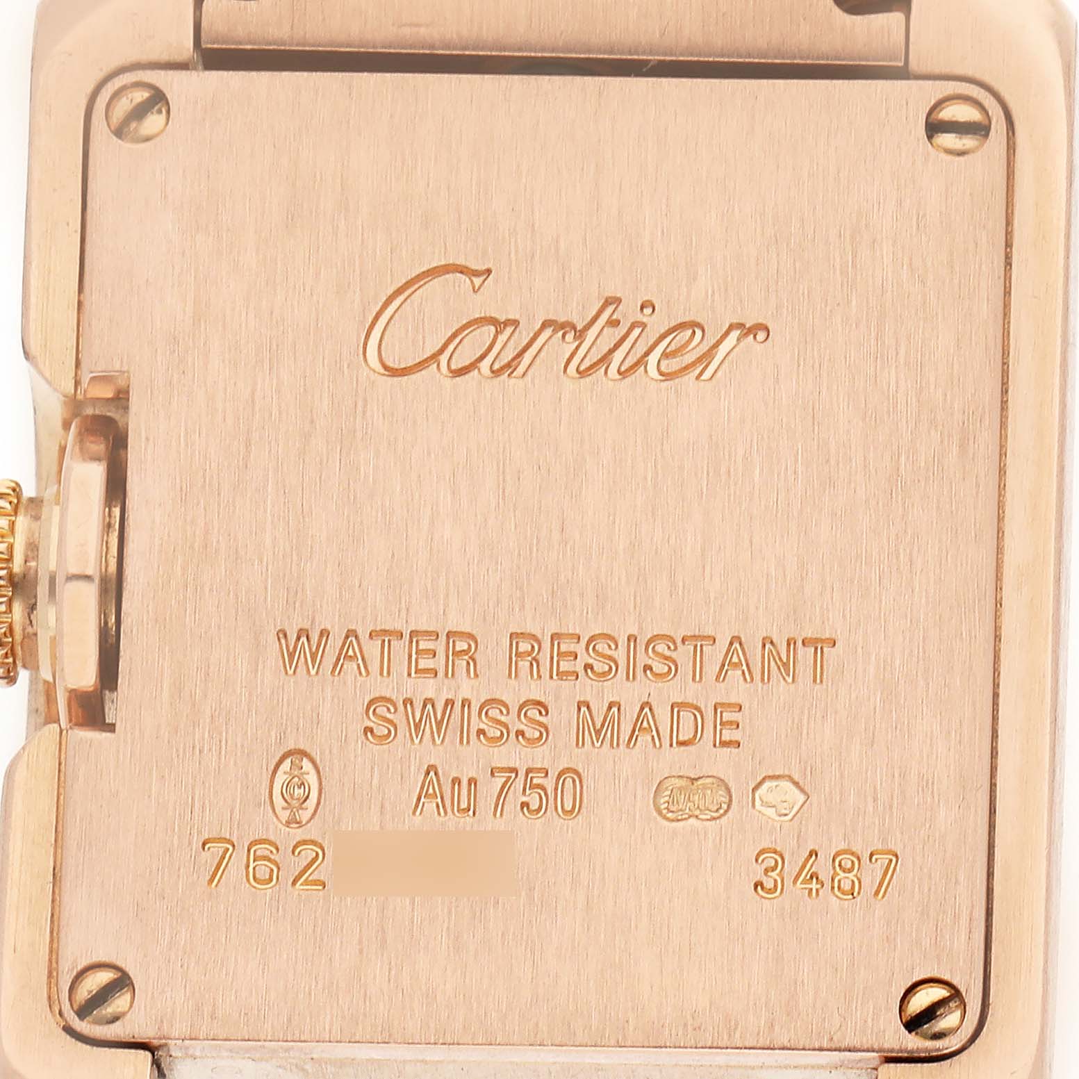 The image shows the back case of a Cartier Tank Anglaise WT100002 Women's Rose Gold Silver Dial watch, highlighting the brand name and water resistance details.
