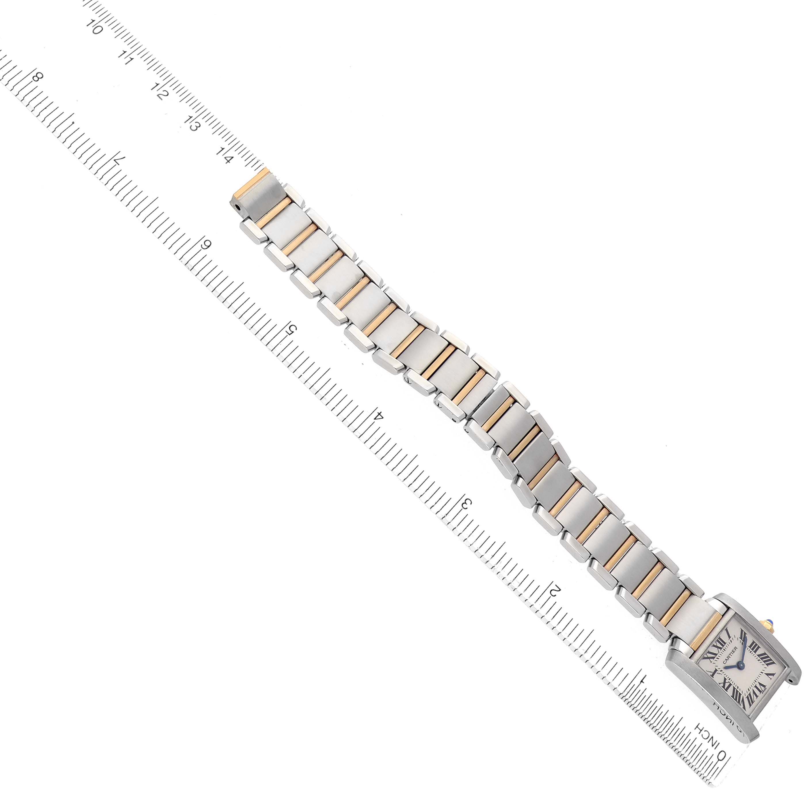 The Cartier Tank Francaise W51007Q4 Women's Steel and Gold (two tone) Silver Dial watch is displayed from a top angle, showing its face, rectangular case, and linked bracelet with a ruler.