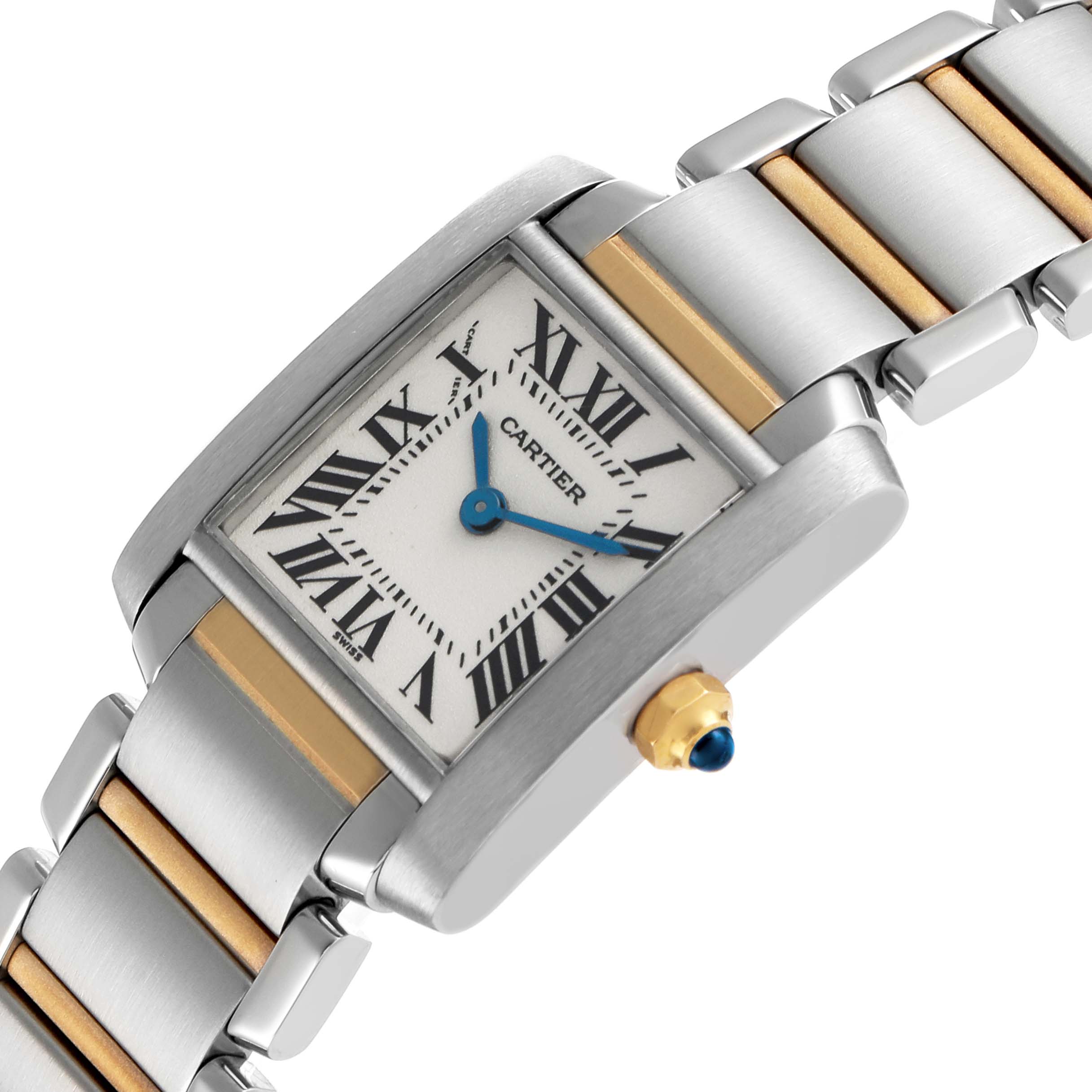 The Cartier Tank Française watch is shown at a tilted angle, highlighting its face, linkage, and crown.