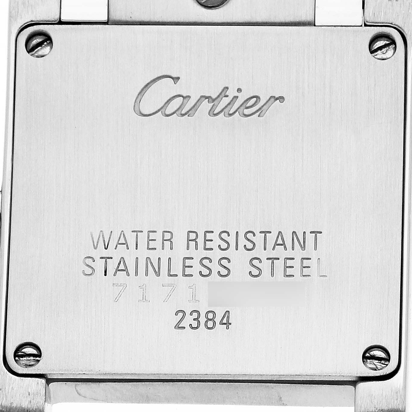 This image shows the back plate of a Cartier Tank Française watch, highlighting the engraved branding and specifications.