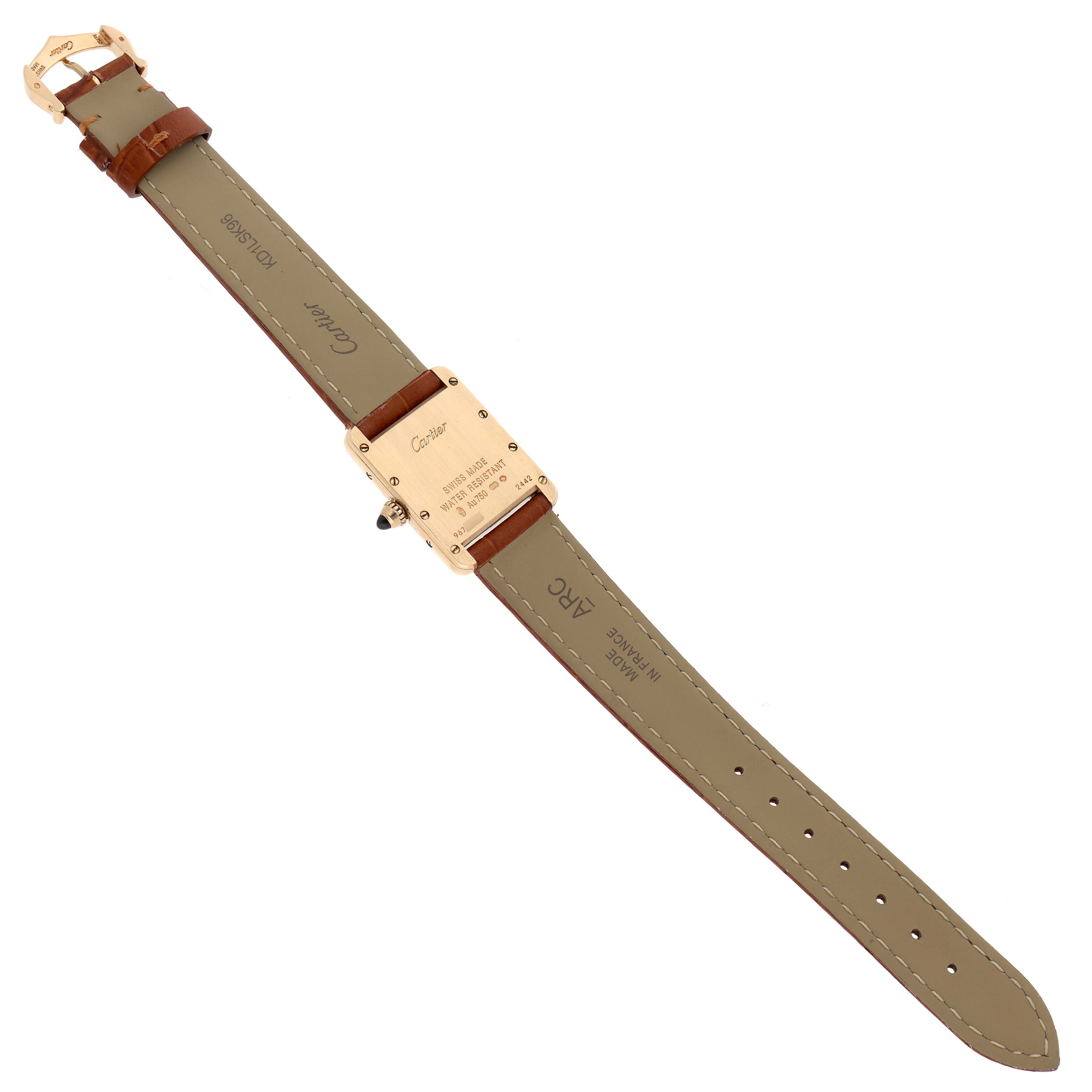 The image shows the back view of the Cartier Tank Louis W1529856 Women's Yellow Gold Silver Dial watch, focusing on the case back, strap, and buckle.