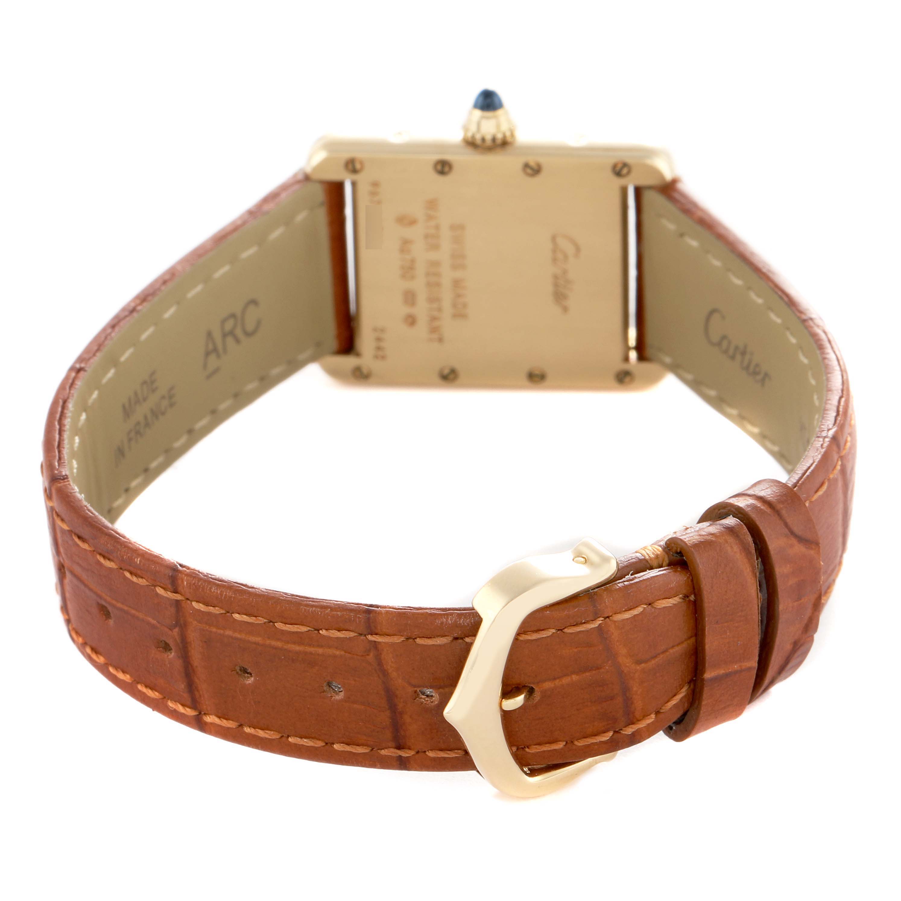 The Cartier Tank Louis W1529856 Women's Yellow Gold Silver Dial watch is shown from the back, highlighting its case back, leather strap, and buckle.