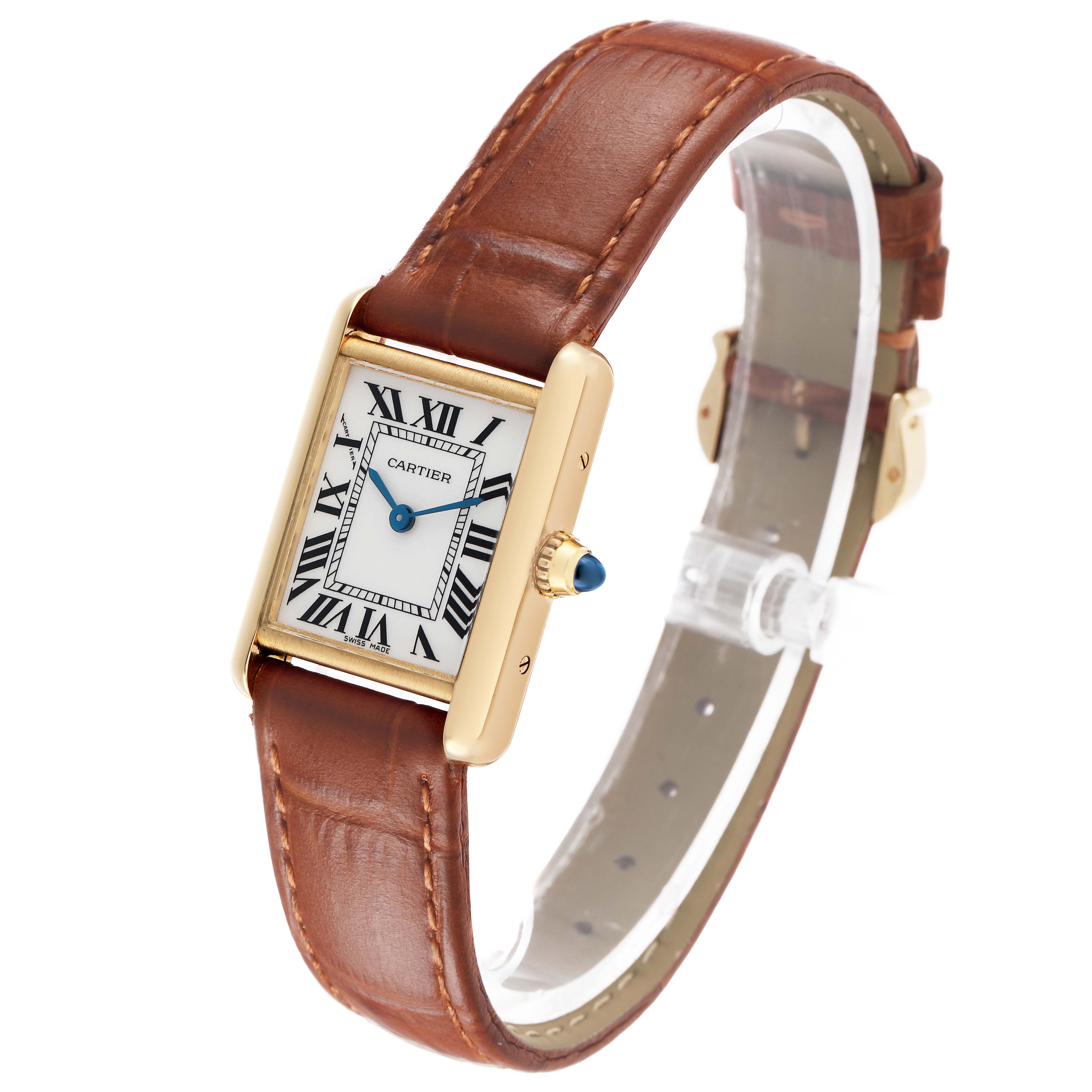 The Cartier Tank Louis W1529856 Women's Yellow Gold Silver Dial watch is shown at a slight angle, displaying its rectangular face, Roman numerals, gold case, blue hands, and brown leather strap.