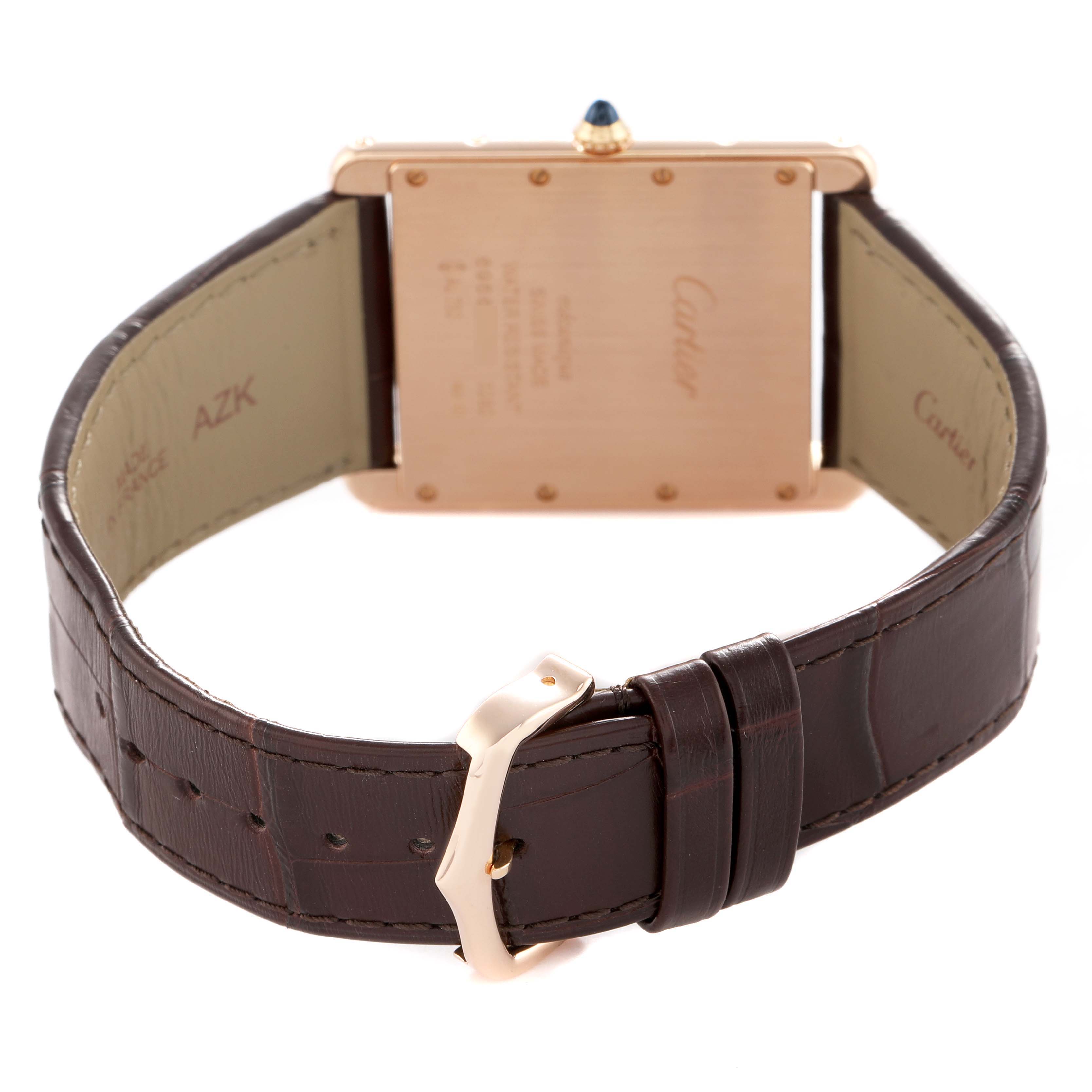 The image shows the back view of the Cartier Tank Louis W1560017 Men's Rose Gold Silver Dial watch, highlighting the case back, crown, and leather strap with buckle.