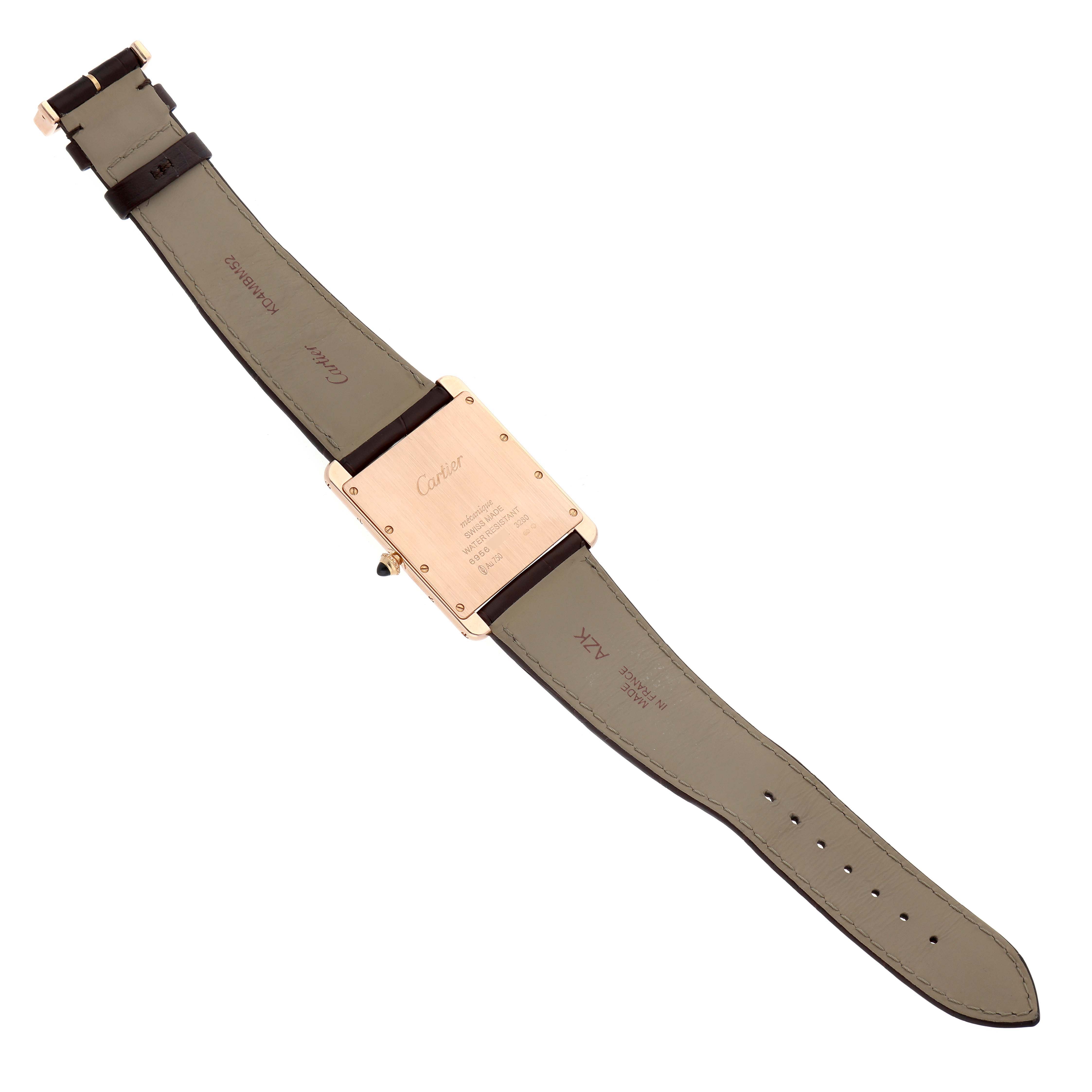 The image shows the back of the Cartier Tank Louis W1560017 Men's Rose Gold Silver Dial watch, highlighting the case, engraving, strap, and buckle.