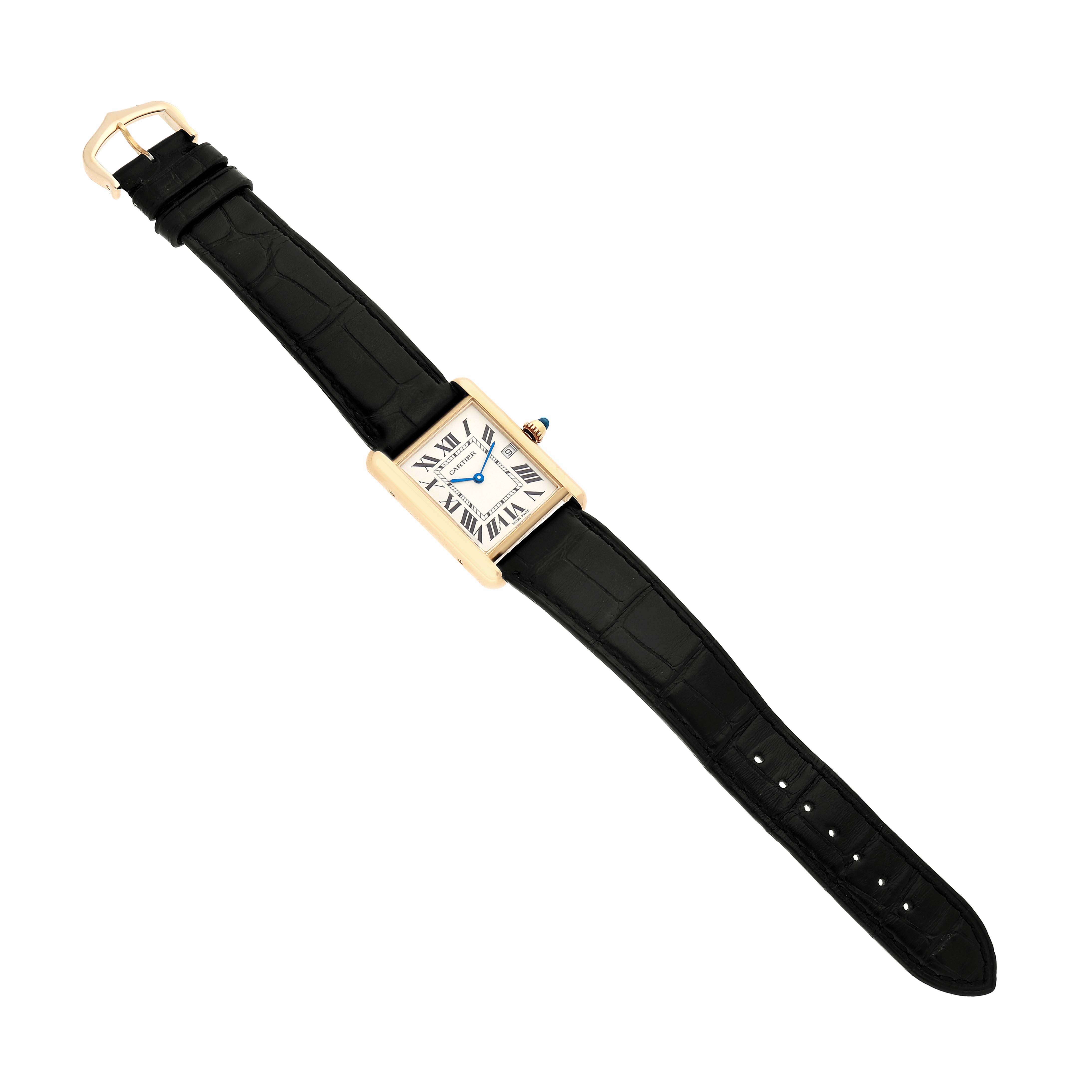 The Cartier Tank Louis W1529756 Men's Yellow Gold Silver Dial watch is shown from a top-down angle, displaying its rectangular face, black leather strap, and gold buckle.