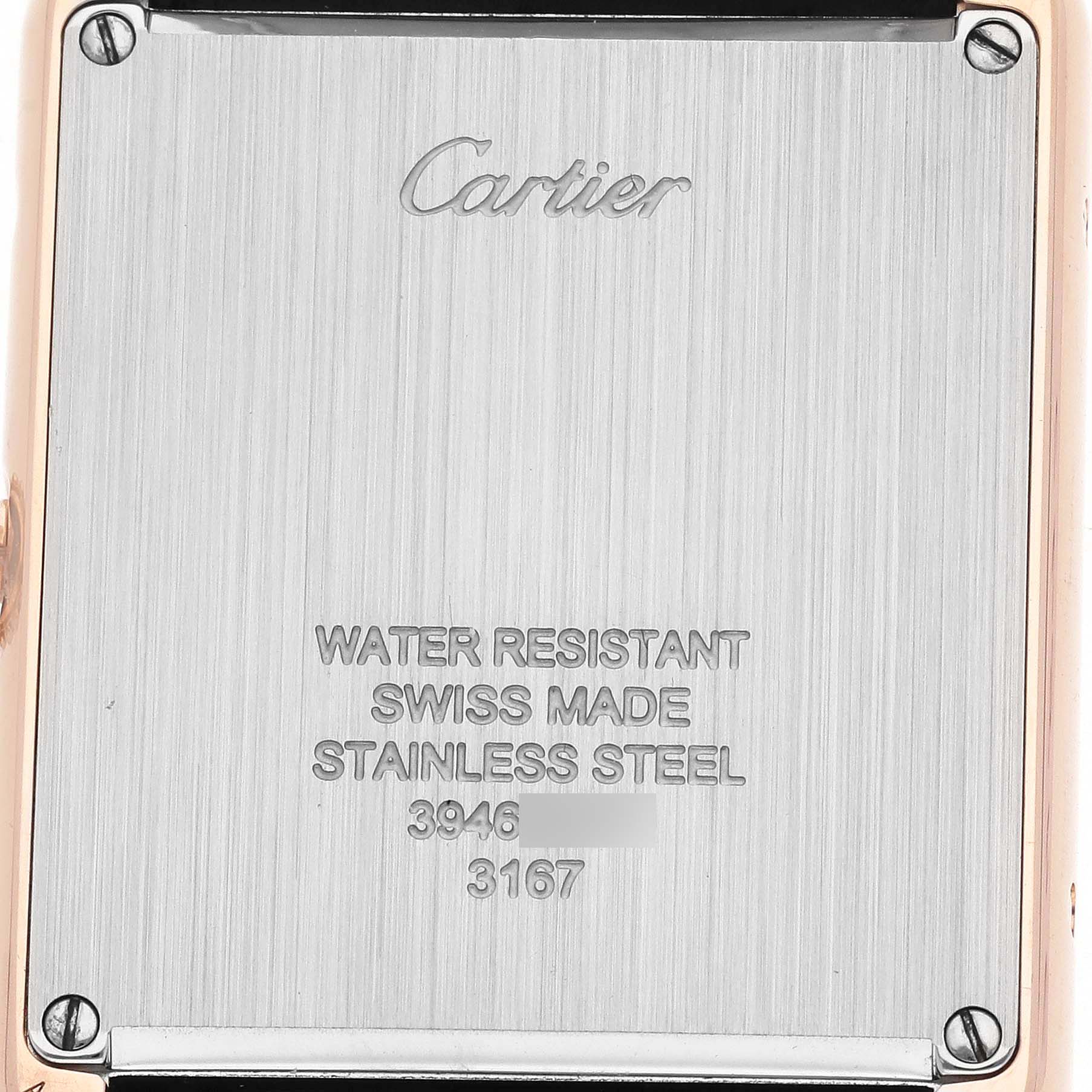 The image shows the back of a Cartier Tank Solo W5200025 Women's Rose Gold Silver Dial watch, displaying the engraved brand, material, and model details.