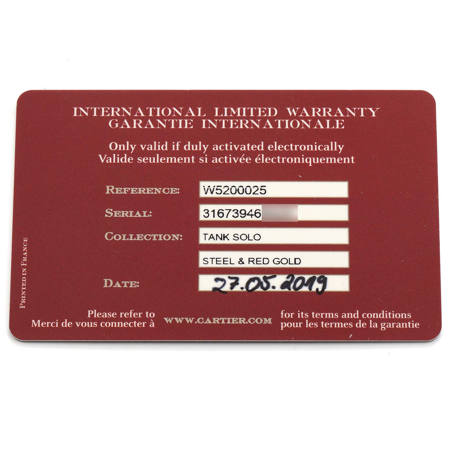 This is an international warranty card for the Cartier Tank Solo W5200025 Women's Rose Gold Silver Dial watch, showing reference, serial, and collection details.