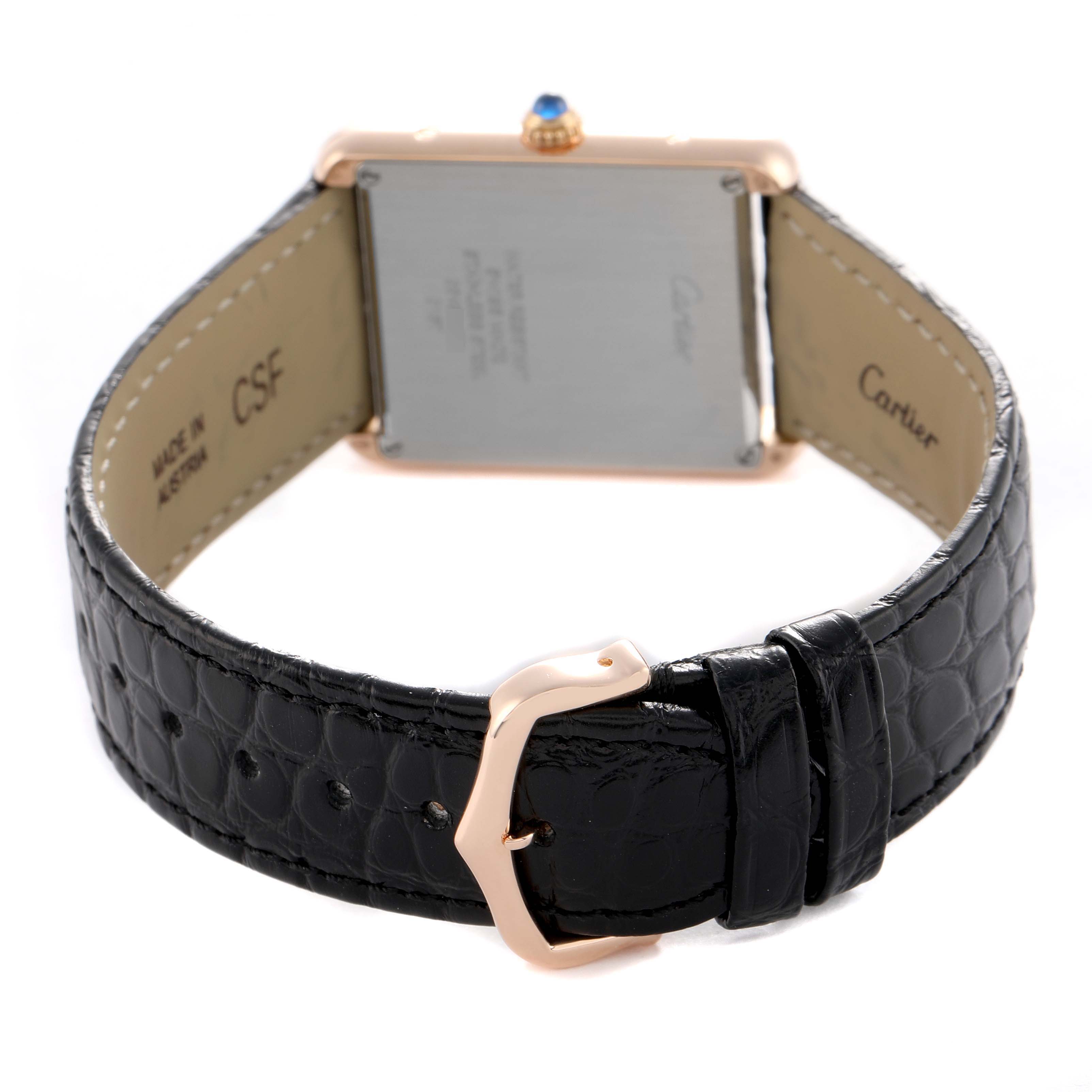 The image shows the back of the Cartier Tank Solo W5200025 Women's Rose Gold Silver Dial watch, highlighting the clasp, strap, and case back detail.