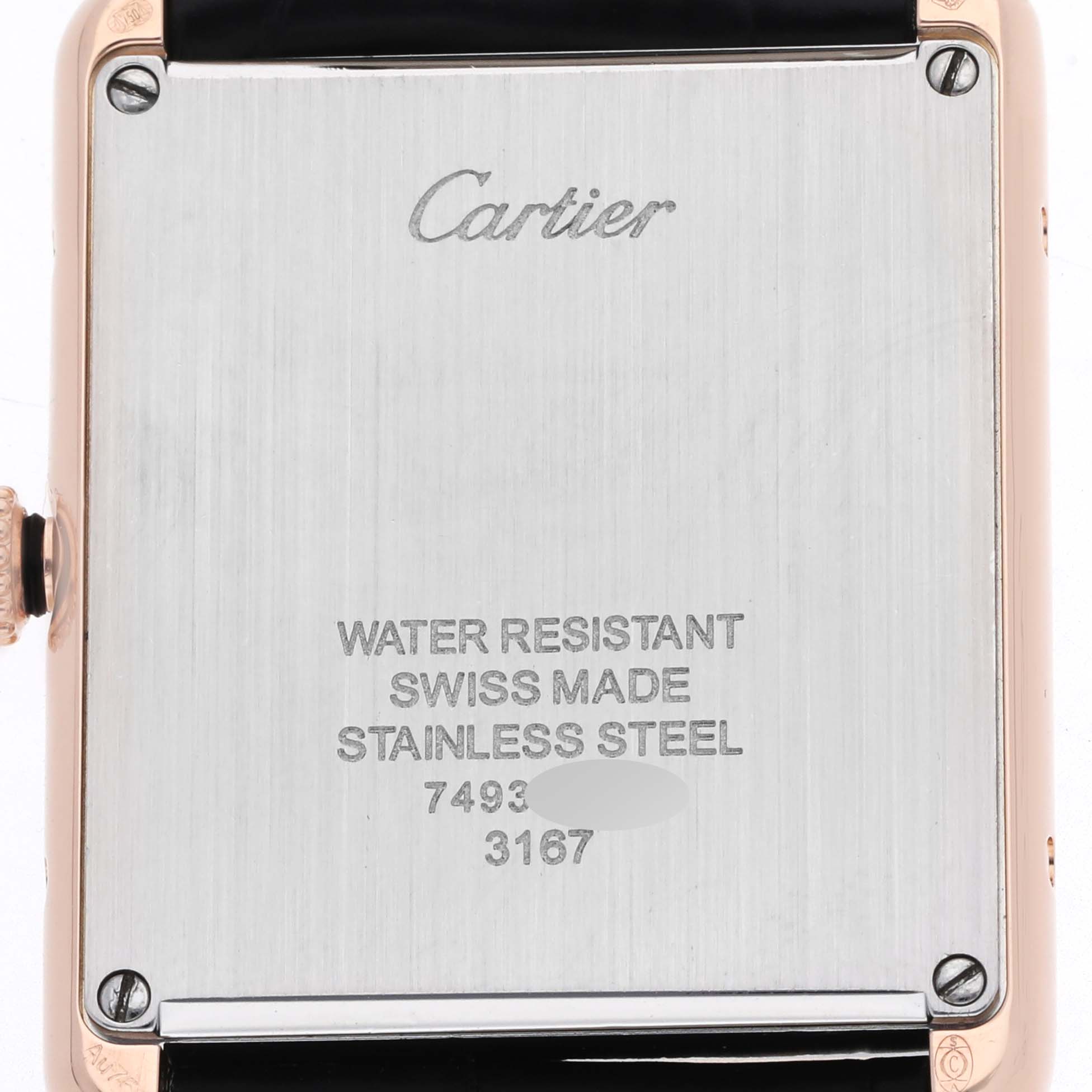 The image shows the back case of the Cartier Tank Solo W5200025 Men's Rose Gold Silver Dial watch, highlighting its stainless steel plate and engraved details.