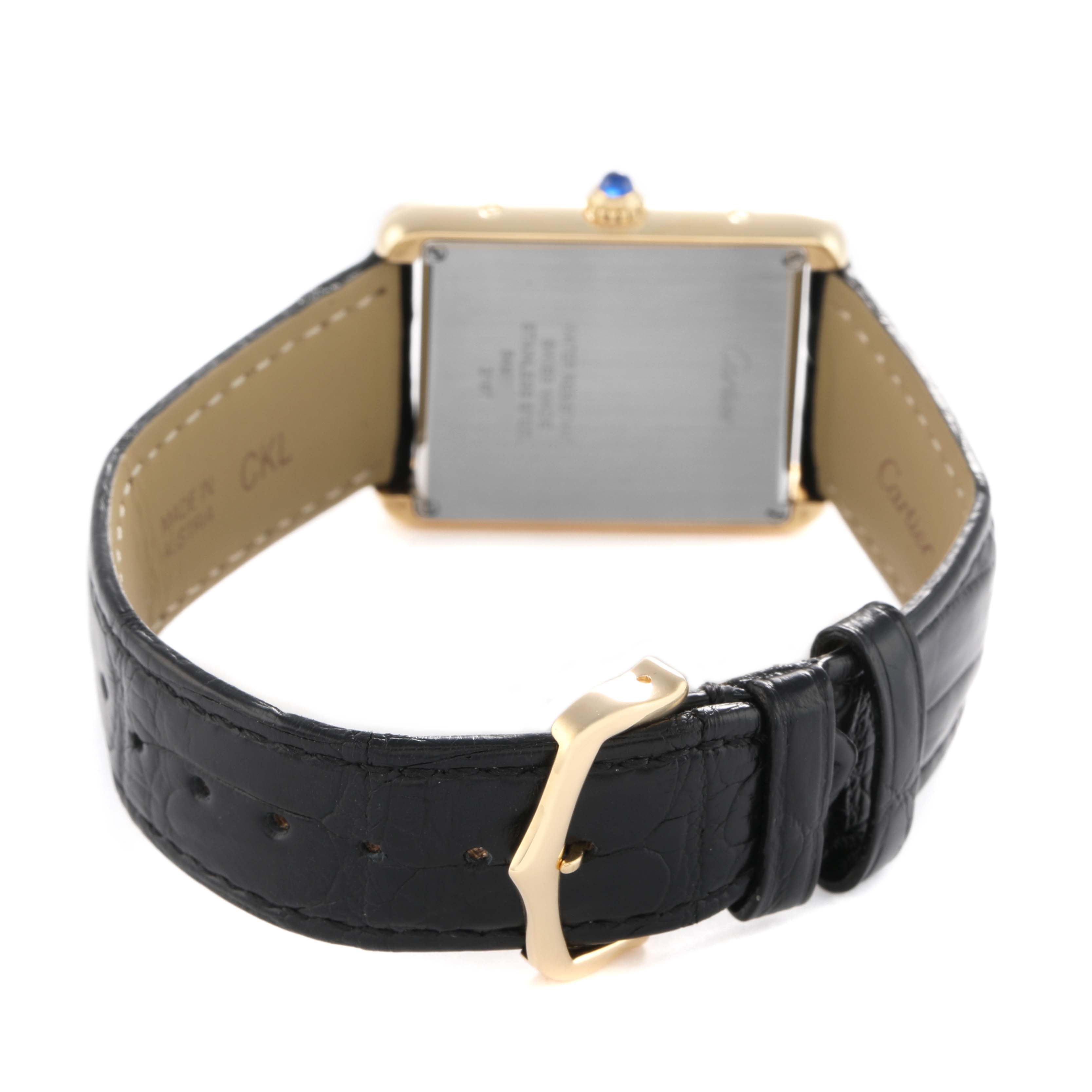 The image shows the back view of the Cartier Tank Solo W5200004 Men's Yellow Gold Silver Dial watch, highlighting its case, strap, and gold buckle.