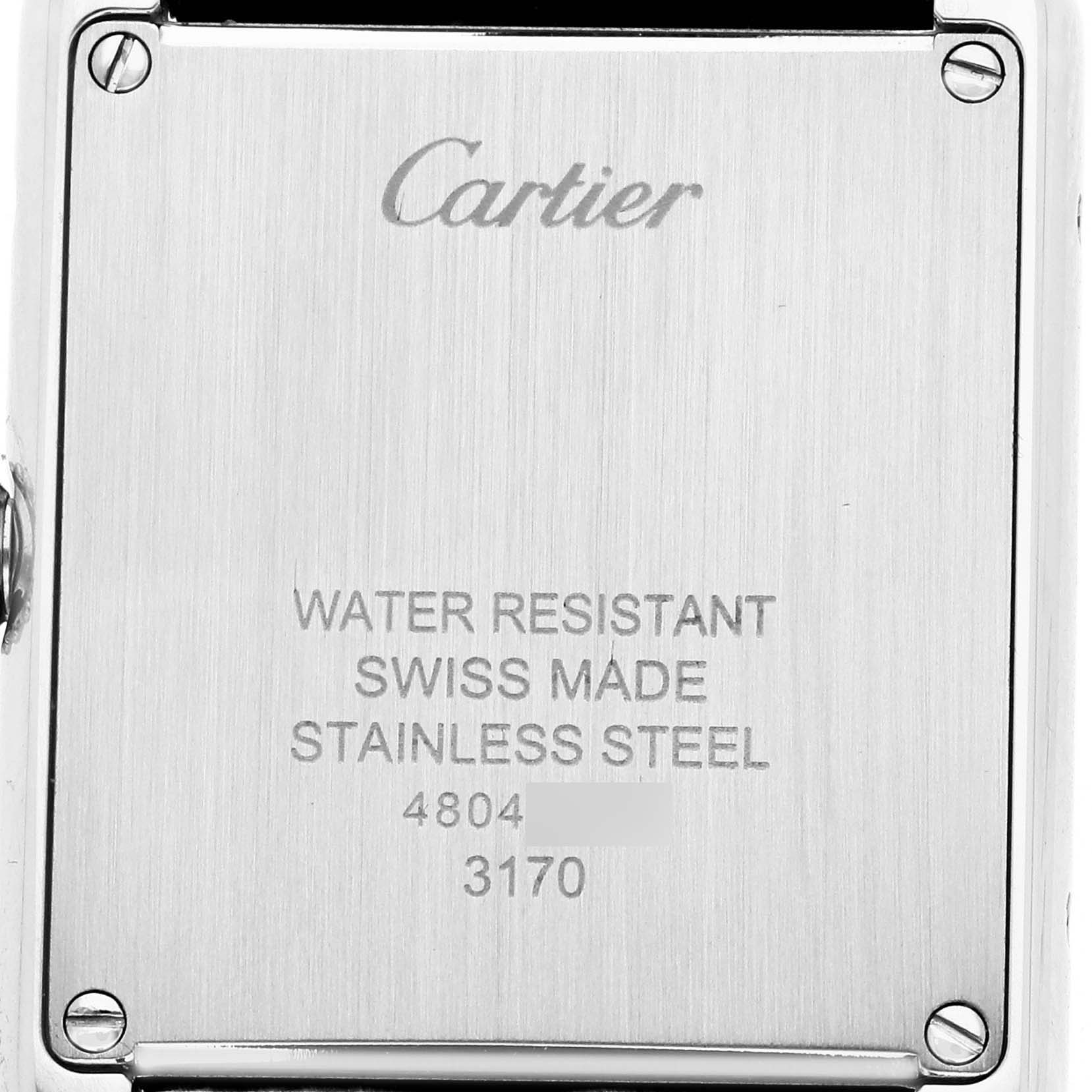 The image shows the back case of the Cartier Tank Solo W5200005 Women's Stainless Steel Silver Dial watch, displaying the branding and specifications.
