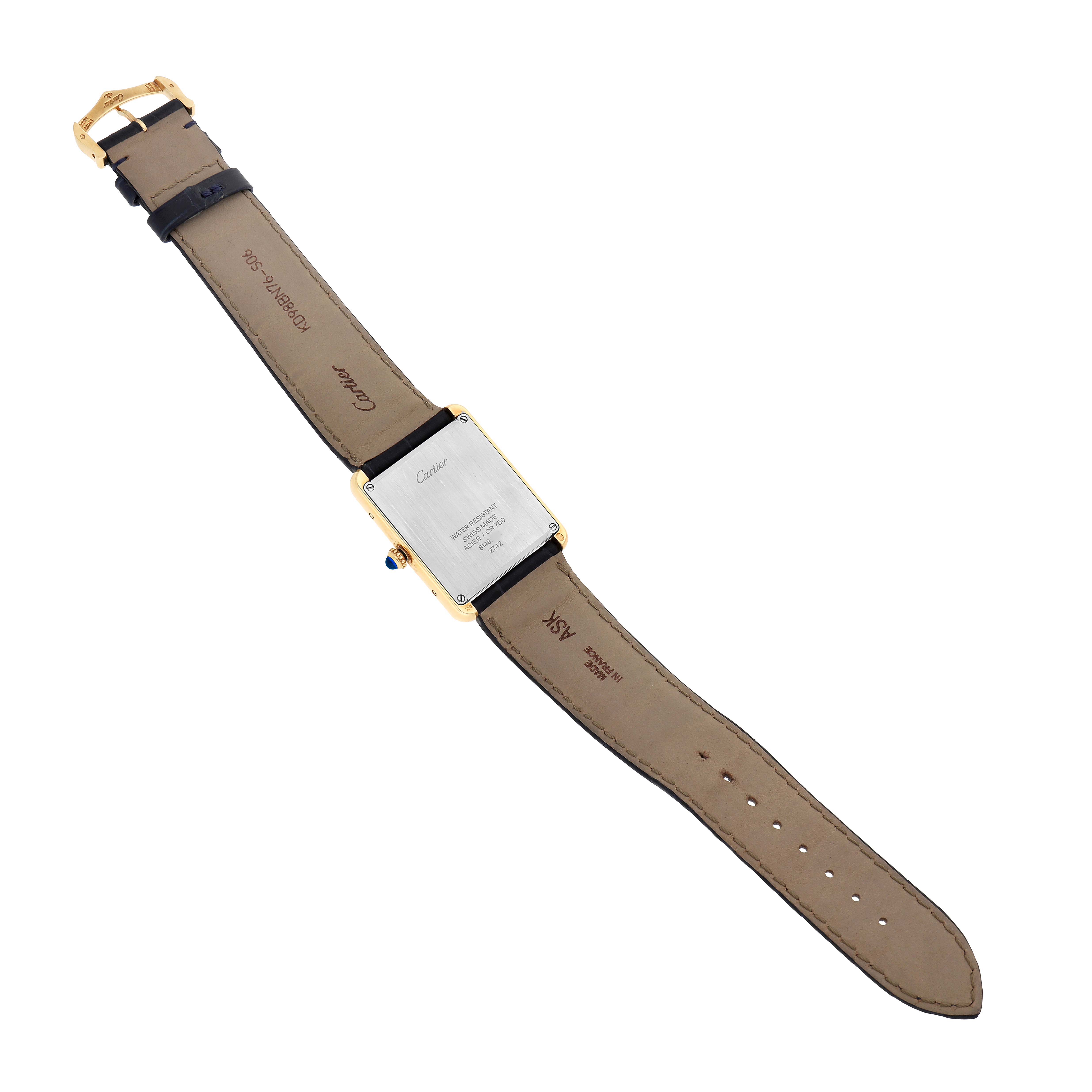 The Cartier Tank Solo W1018855 Men's Yellow Gold Silver Dial watch is shown from the back, displaying the case back, strap, and buckle.