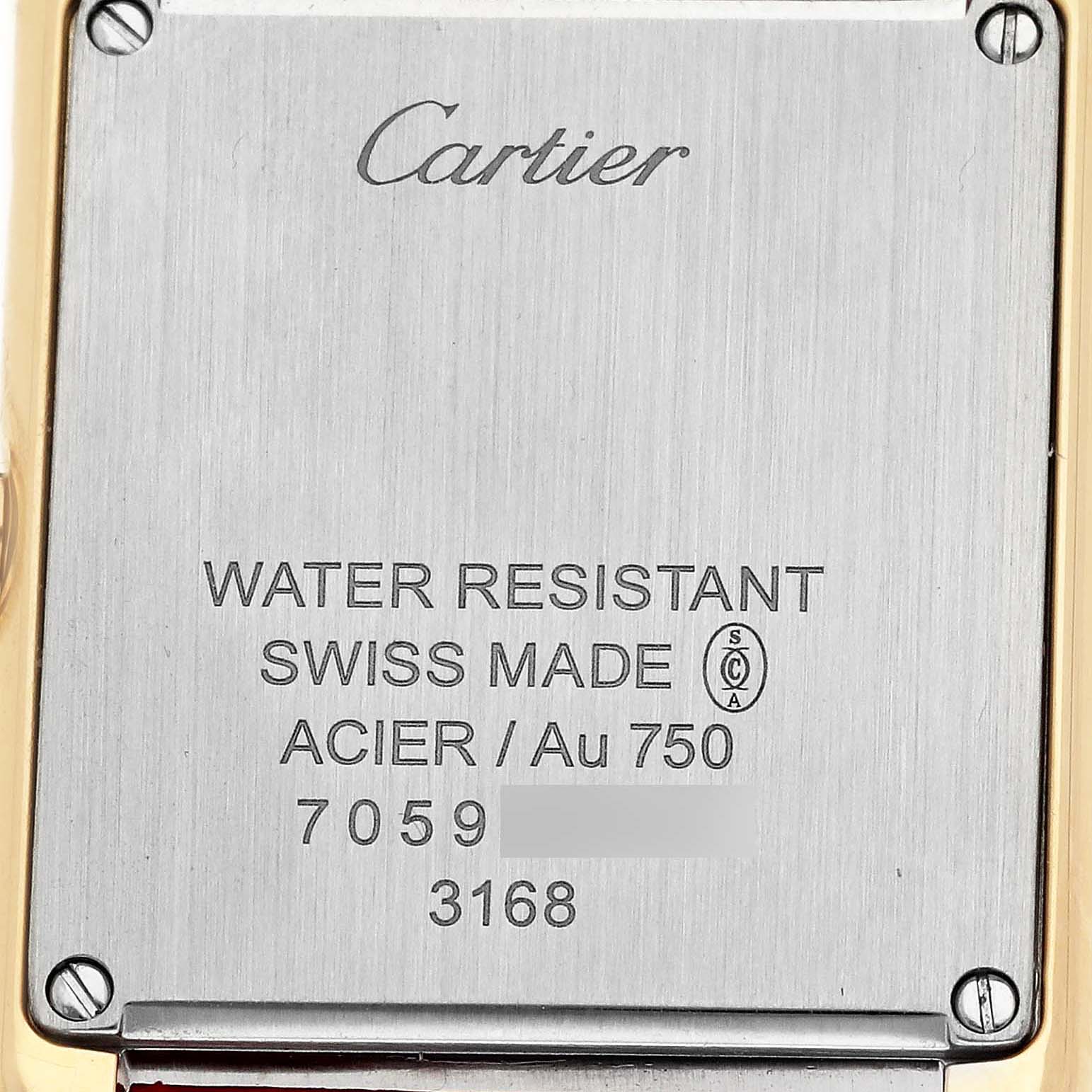 The image shows the back of a Cartier Tank Solo W5200002 Women's Yellow Gold Silver Dial watch, displaying details like material and water resistance engraving.