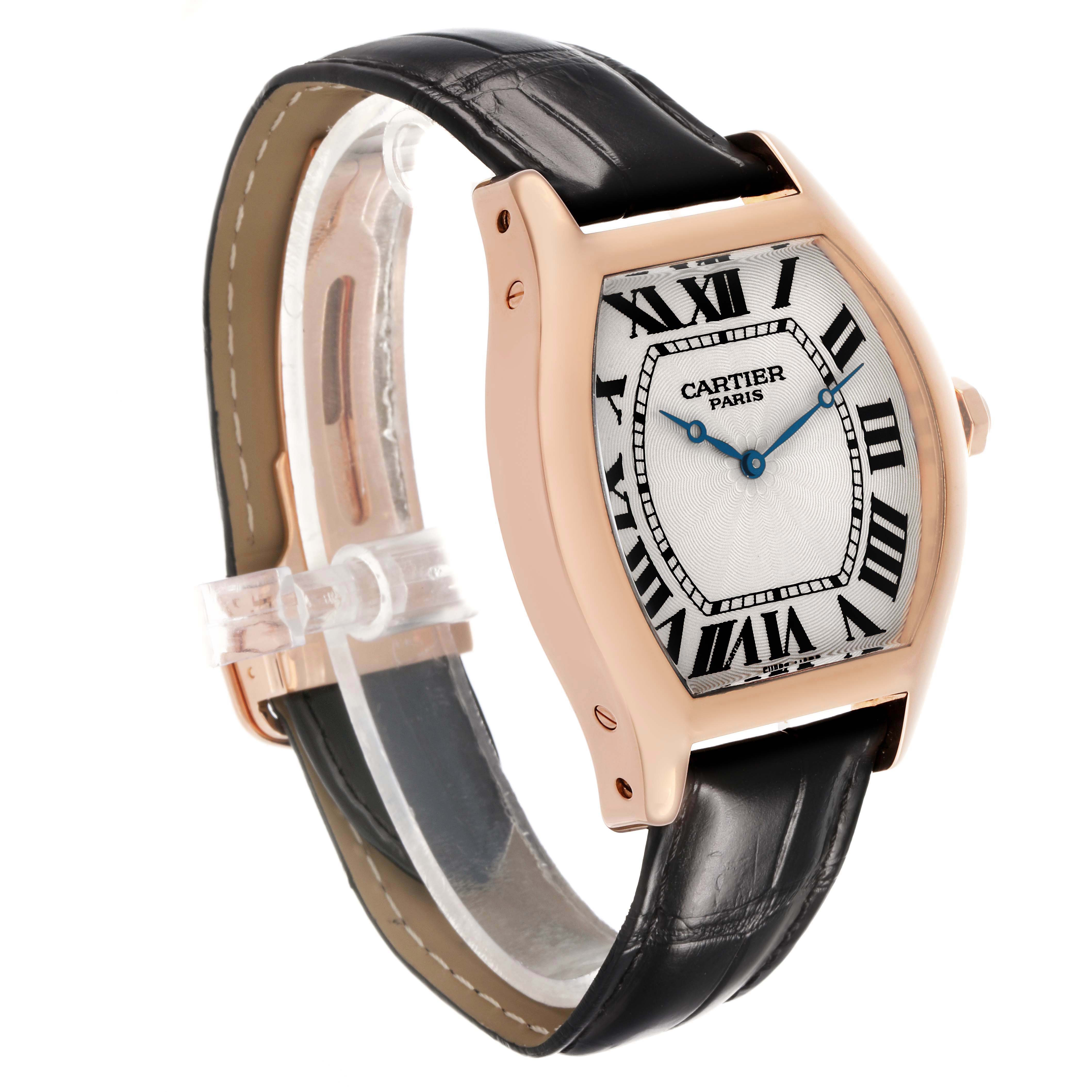 The Cartier Tortue W1546051 Men's Rose Gold Silver Dial watch is shown at a three-quarter angle, highlighting its rose gold case, dial, and black leather strap.