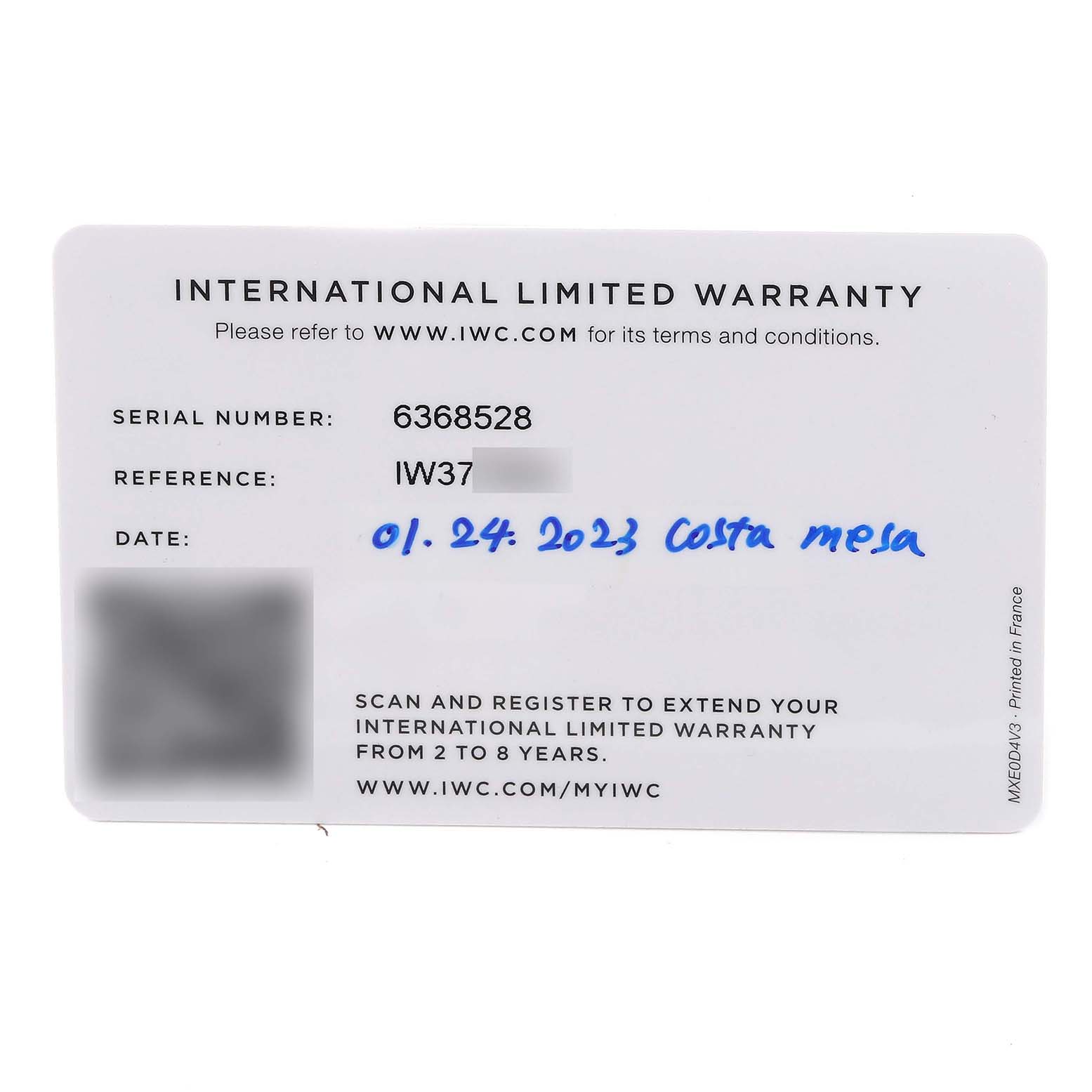 This image shows the International Limited Warranty card for an IWC Pilot IW377903 Men's Titanium Grey Dial model watch.