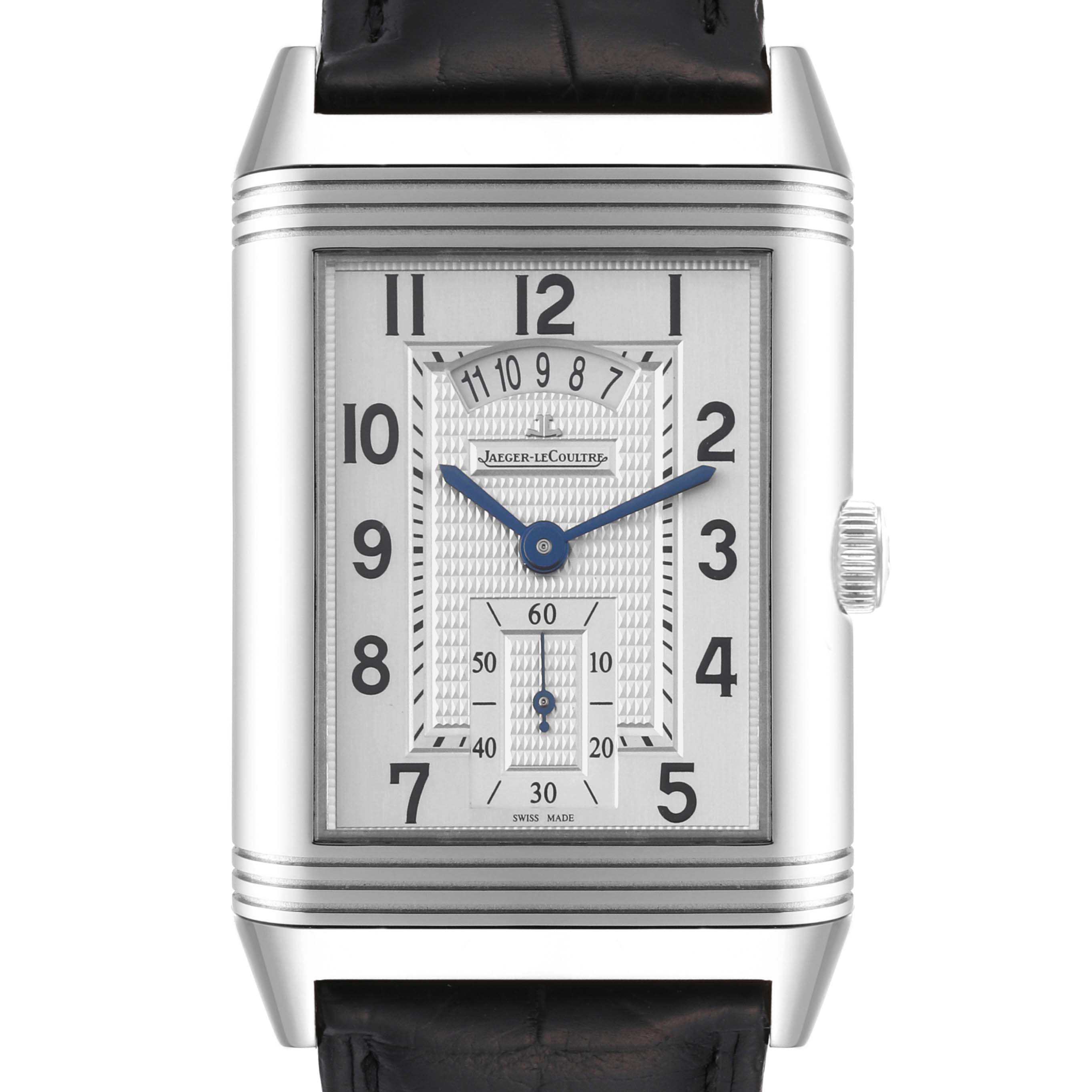 The Jaeger-LeCoultre Reverso watch is shown from a front angle, highlighting its rectangular dial, case, and crown.