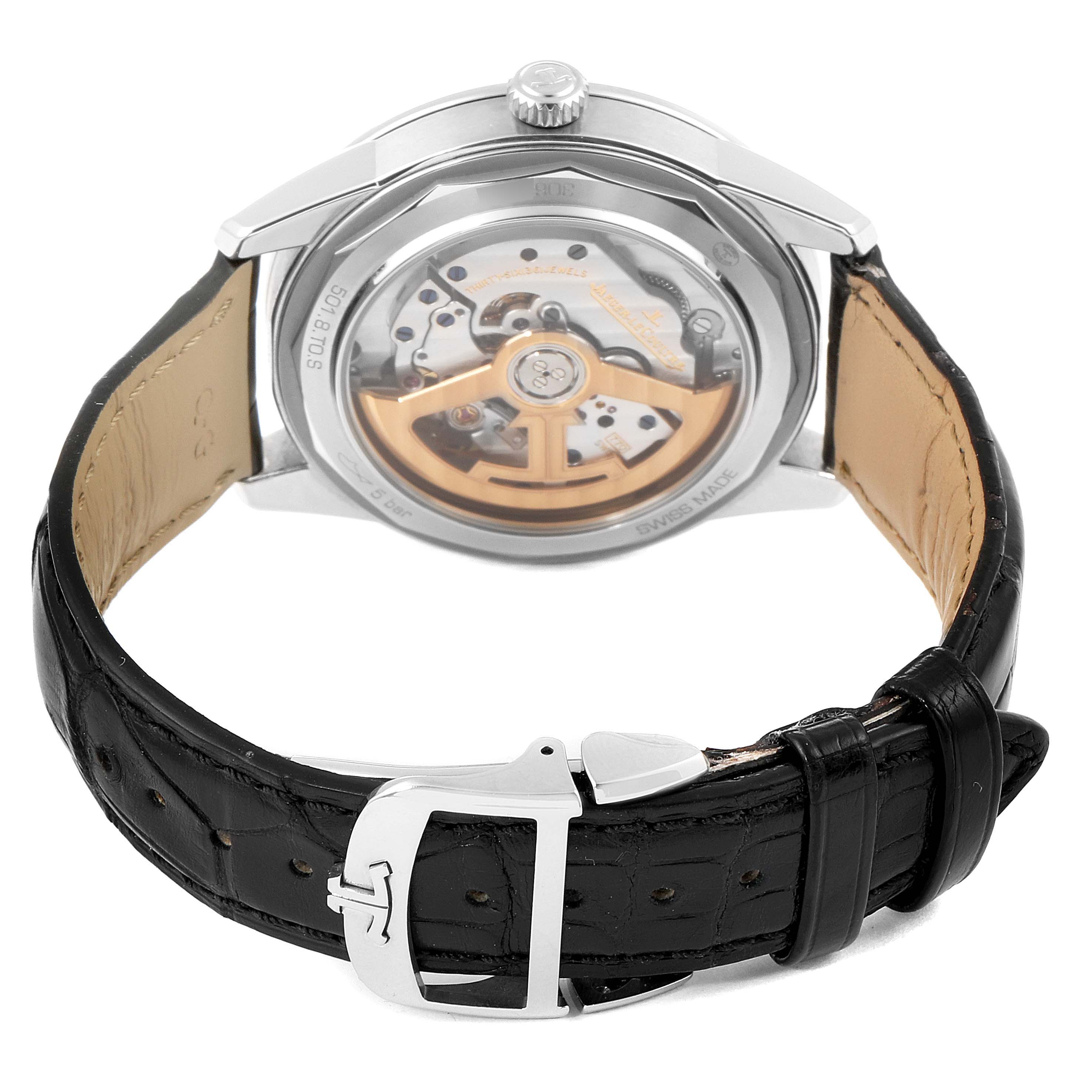 The image shows the back view of a Jaeger-LeCoultre Geophysic watch, highlighting its open case back and black leather strap.