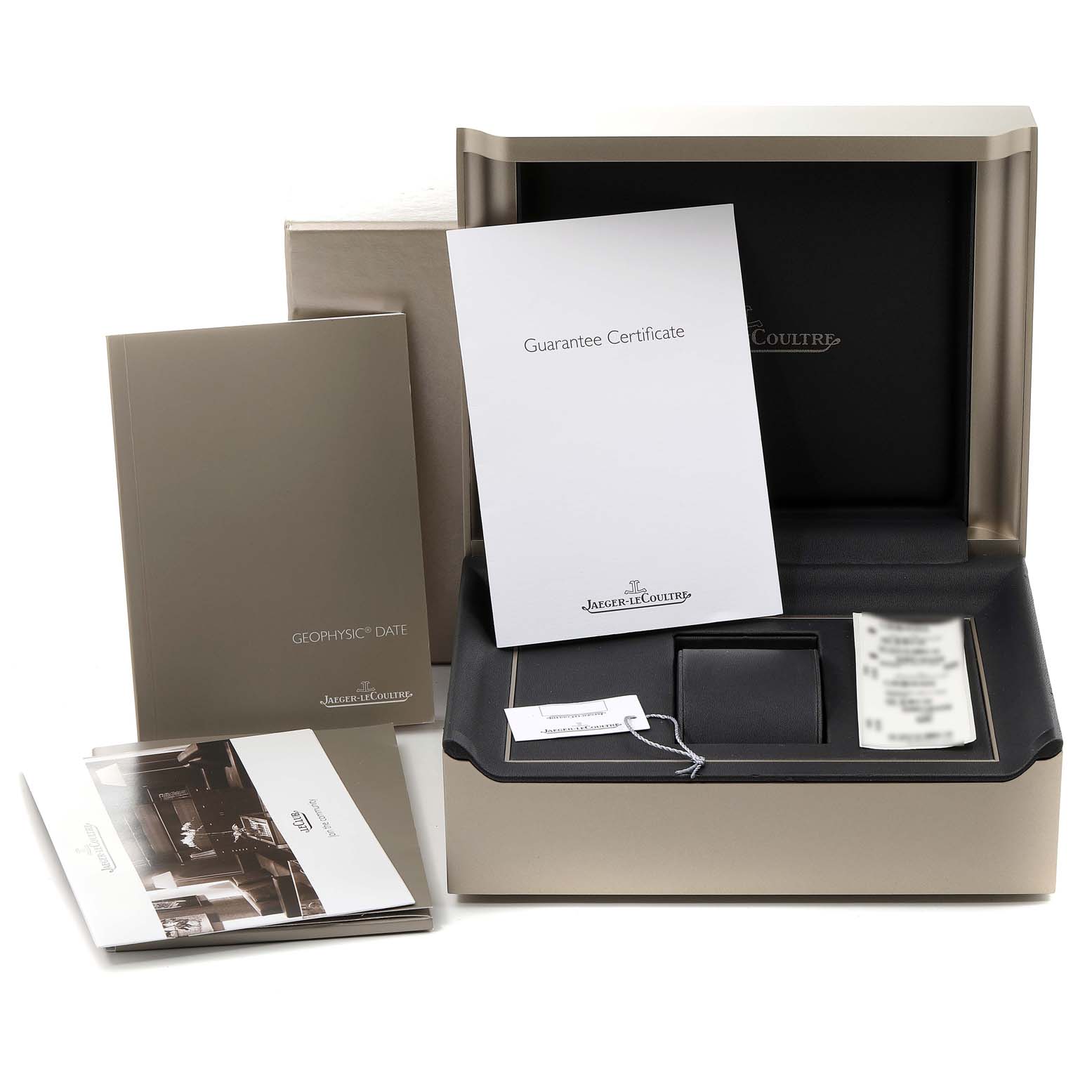 The image shows the packaging and accessories, including guarantee certificate and manuals, for a Jaeger LeCoultre Geophysic Q8018420 Men's Stainless Steel Silver Dial Q8018420 Men's Stainless Steel Silver Dial watch.
