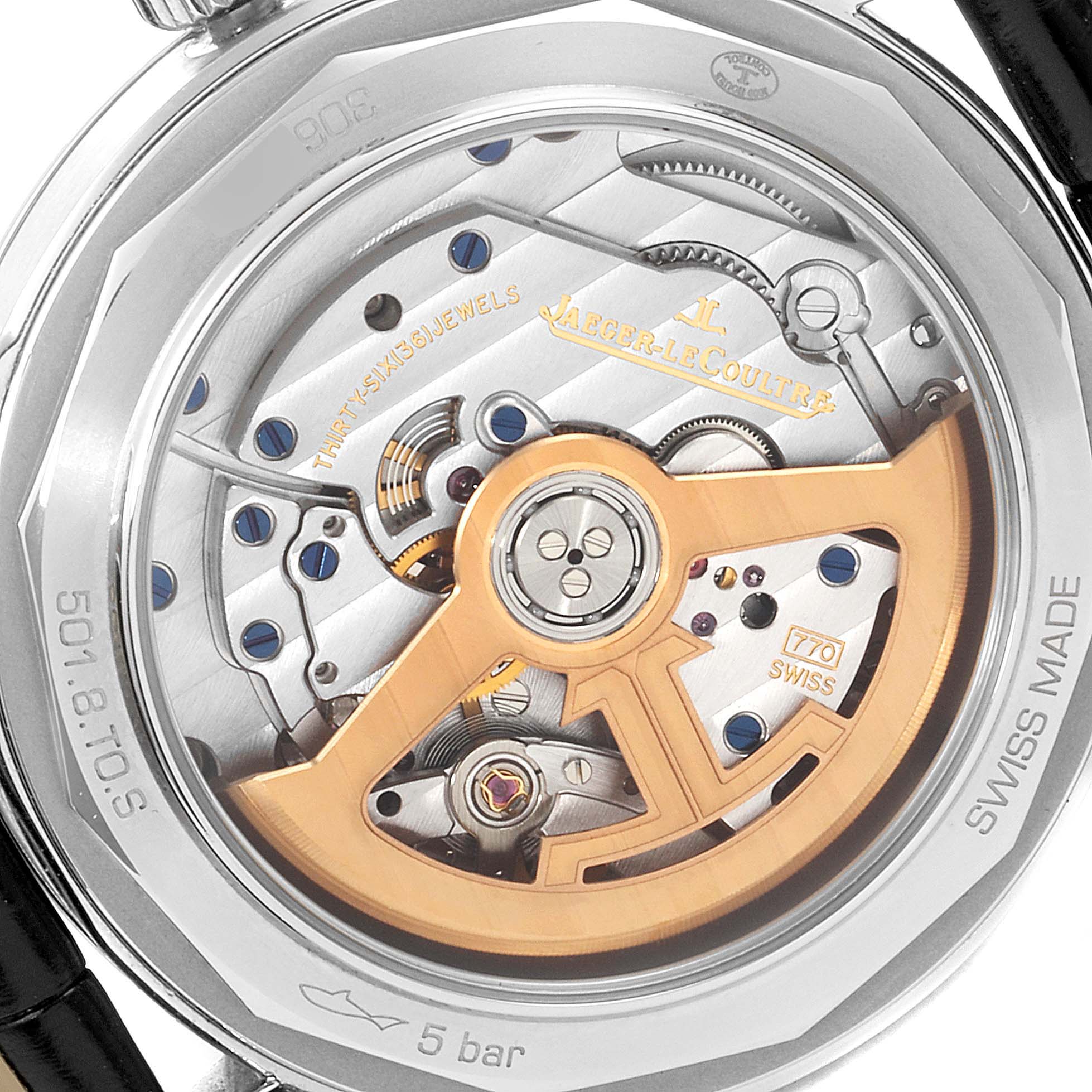 The image shows the backside of the Jaeger LeCoultre Geophysic Q8018420 Men's Stainless Steel Silver Dial Q8018420 Men's Stainless Steel Silver Dial watch, highlighting the intricate internal mechanical movement.