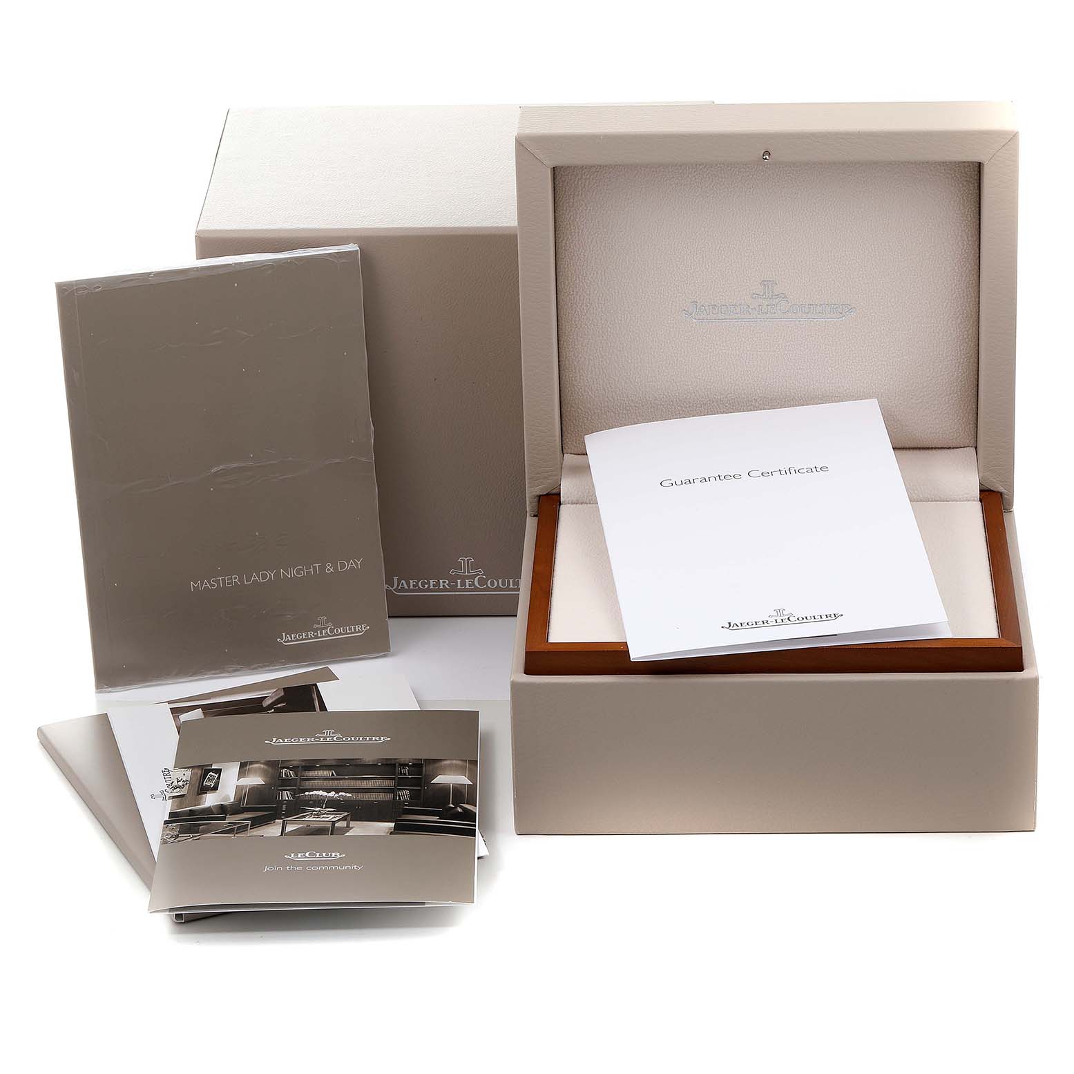This angle shows the packaging, guarantee certificate, and manuals for the Jaeger-LeCoultre Rendez-Vous watch.