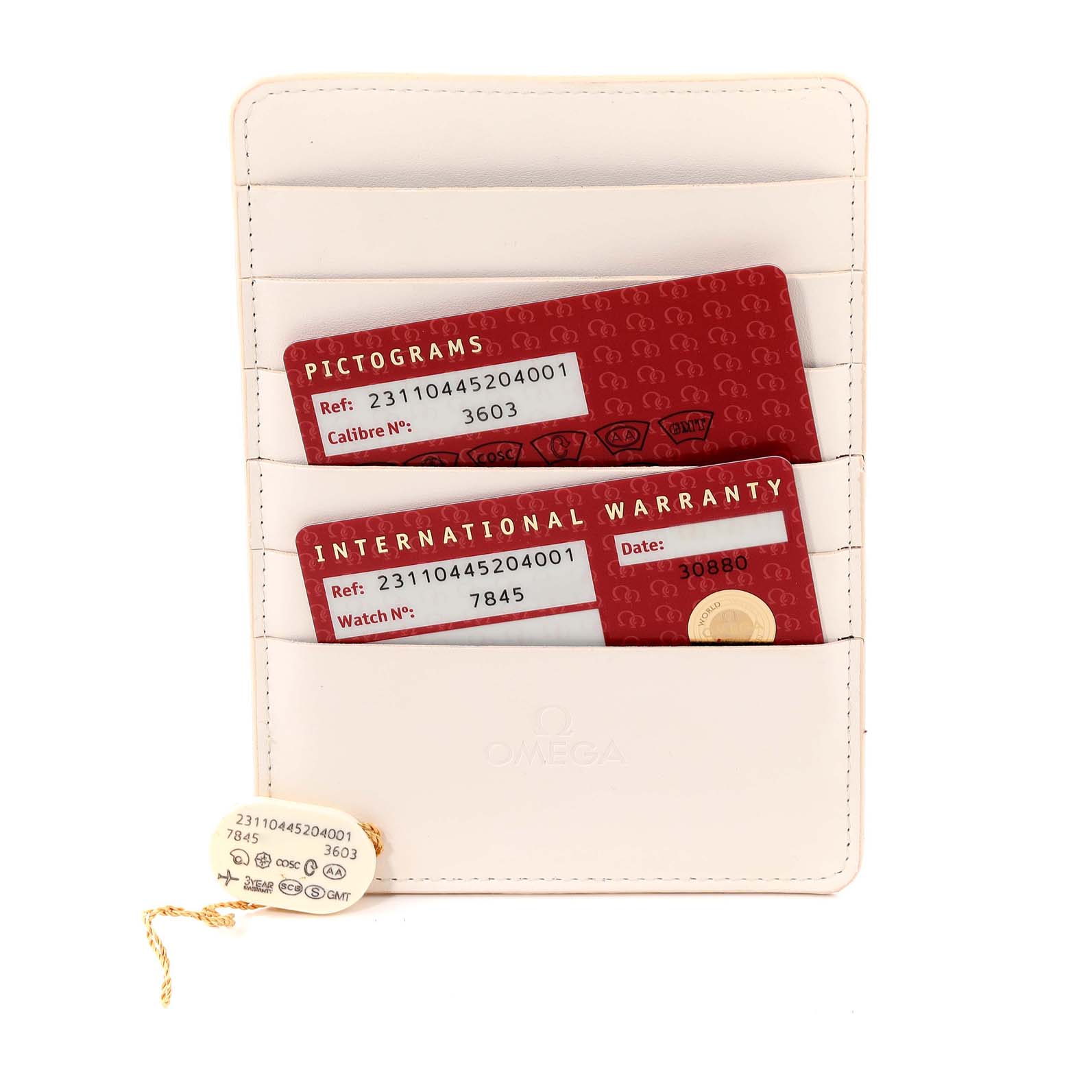 The image shows warranty and pictogram cards for the Omega Seamaster 231.10.44.52.04.001 Men
s Stainless Steel White Dial 231.10.44.52.04.001 Men
s Stainless Steel White Dial model, along with a white cardholder.