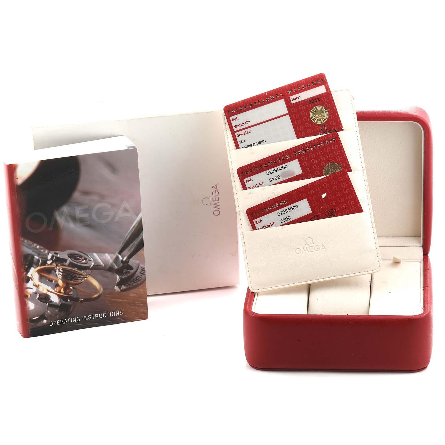 The image shows Omega Planet Ocean 2208.50.00 Men's Stainless Steel Black Dial accessories: an open red case, operating instructions, and warranty cards.