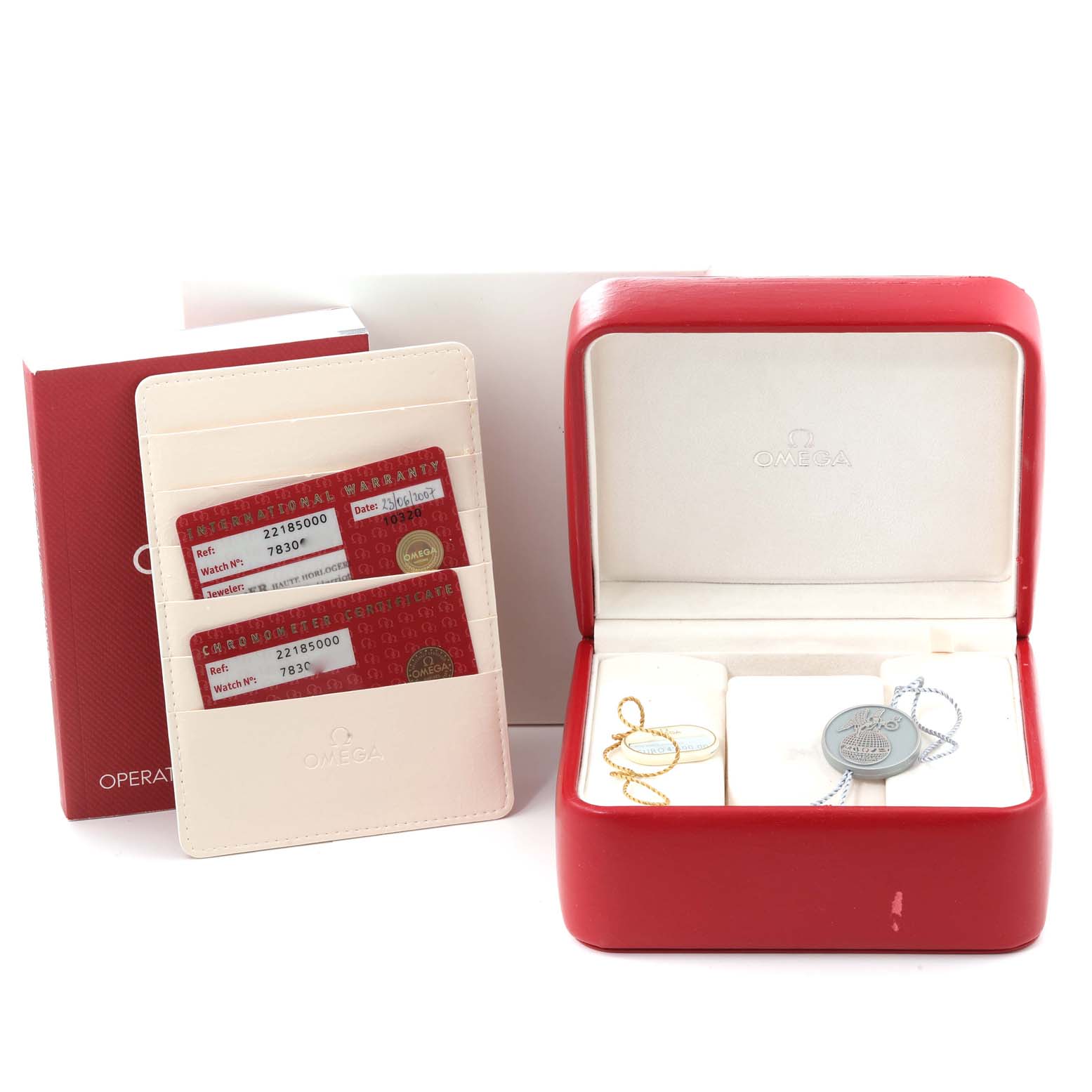 The image shows the Omega Planet Ocean 2218.50.00 Men
s Stainless Steel Black Dial 2218.50.00 Men
s Stainless Steel Black Dial packaging, warranty cards, operating manual, and an open watch box.