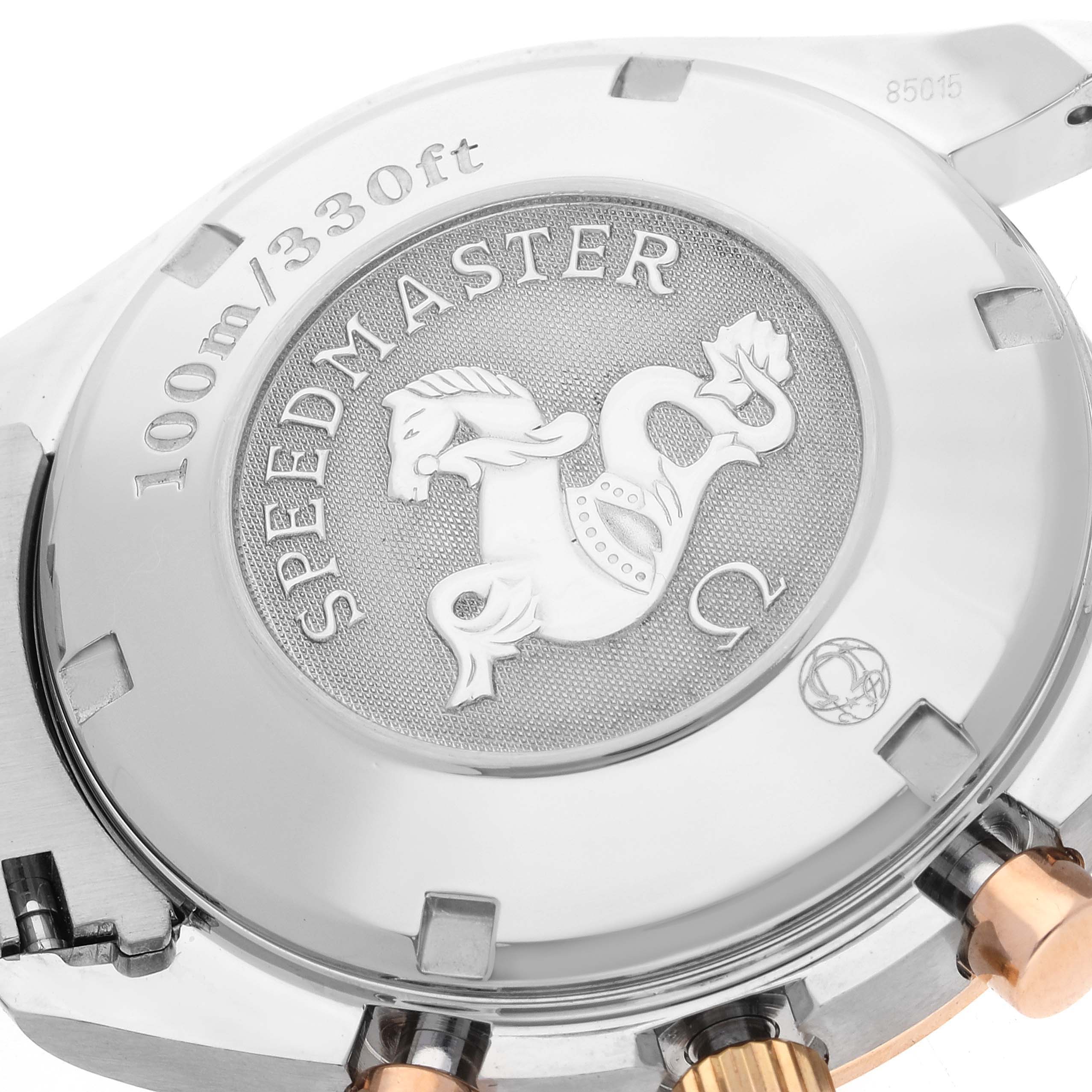 This image shows the back of an Omega Speedmaster 323.21.40.40.01.001 Men's Steel and Gold (two tone) Black Dial 323.21.40.40.01.001 Men's Steel and Gold (two tone) Black Dial watch, highlighting the engraved logo and water resistance details.