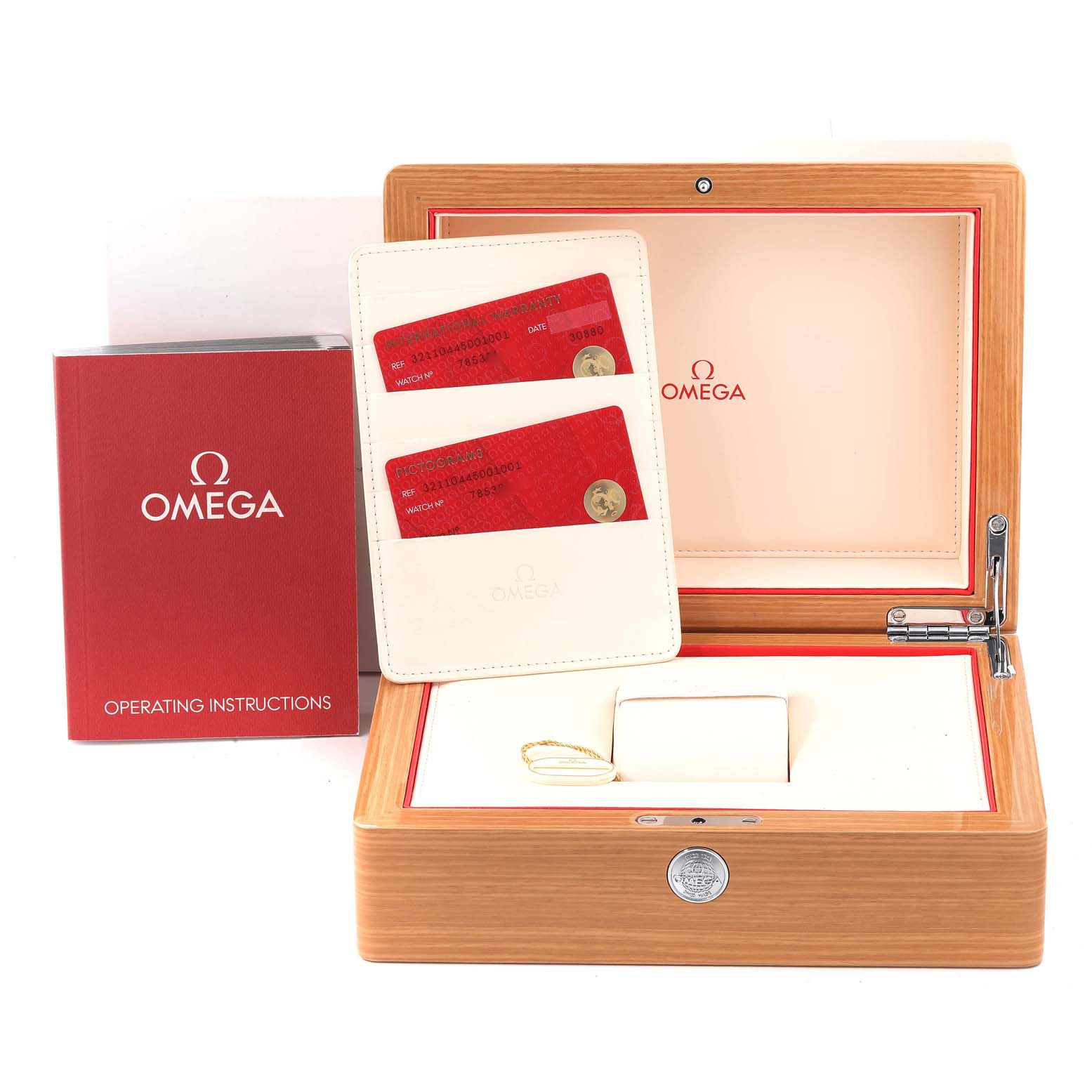 The image shows an Omega Speedmaster 321.10.44.50.01.001 Men
s Stainless Steel Black Dial 321.10.44.50.01.001 Men
s Stainless Steel Black Dial box with operating instructions and warranty cards displayed.